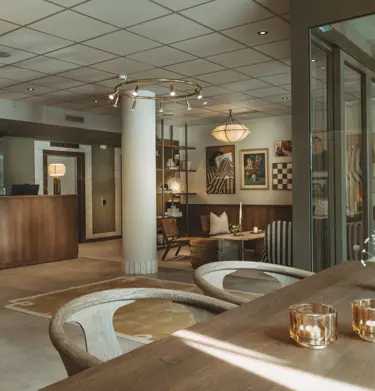 Hotel lobby with reception desk and lounge