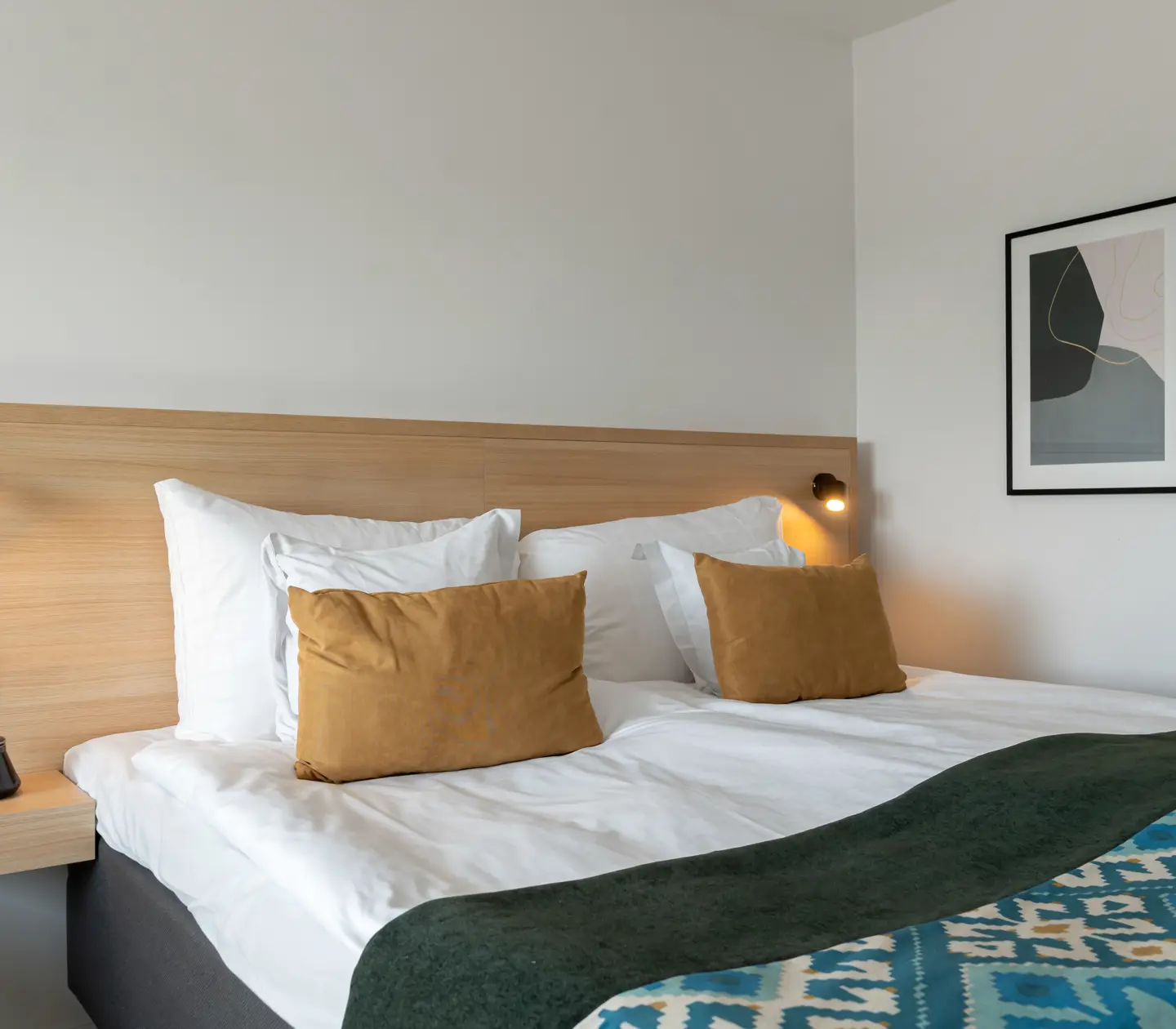 Hotel room with double bed and blackboard