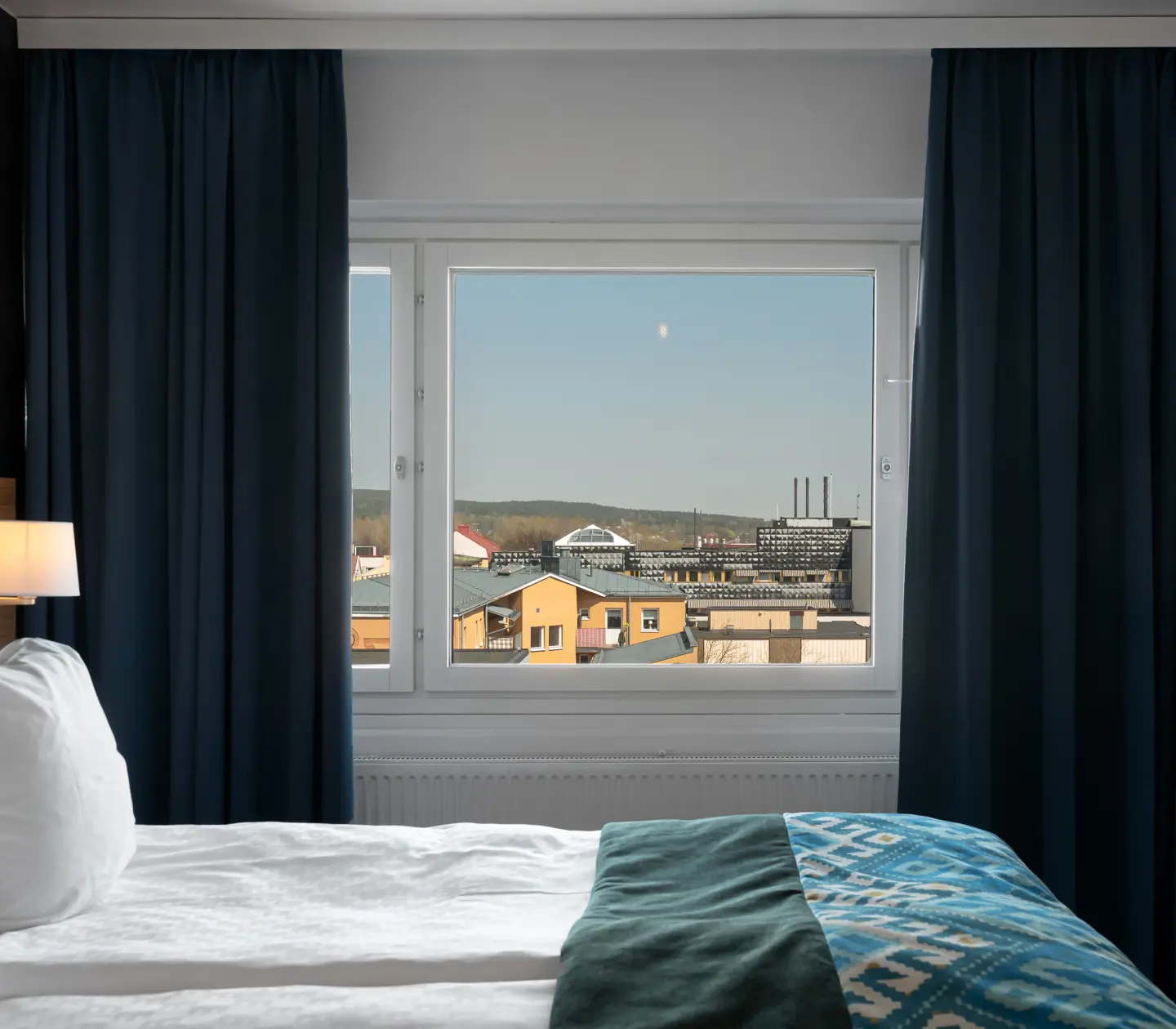 Suite with double bed and window with a view