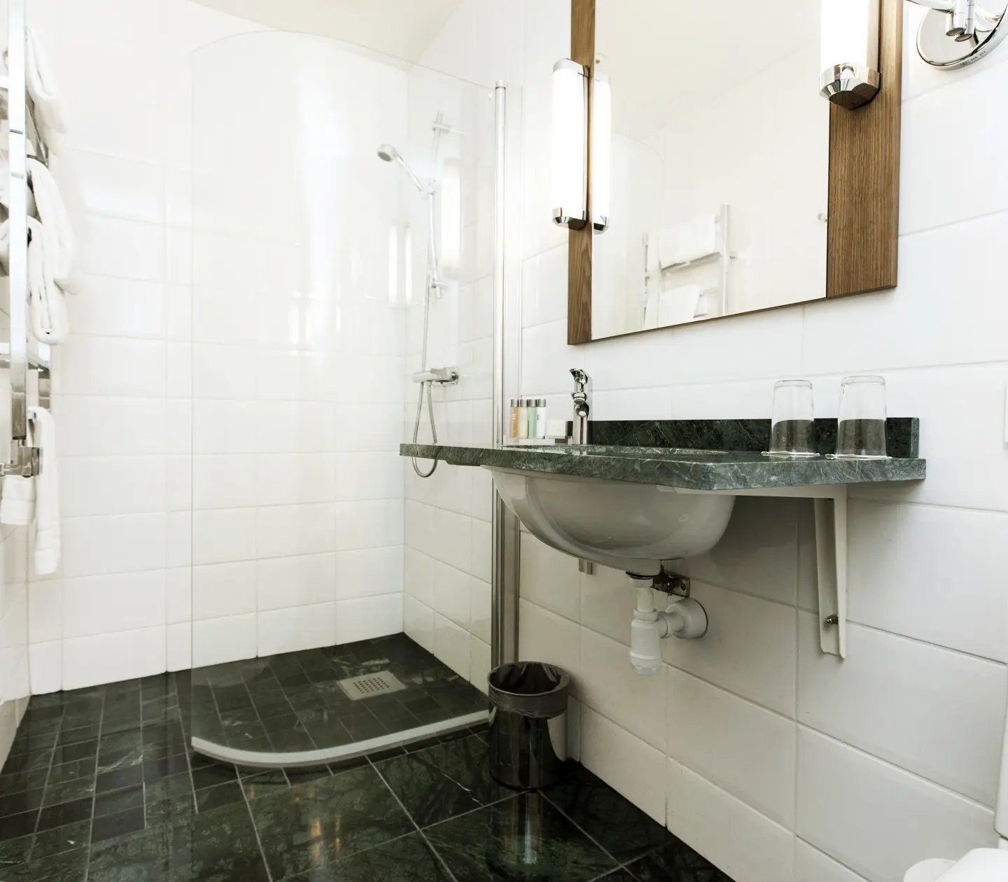 Bathroom with shower, sink and mirror