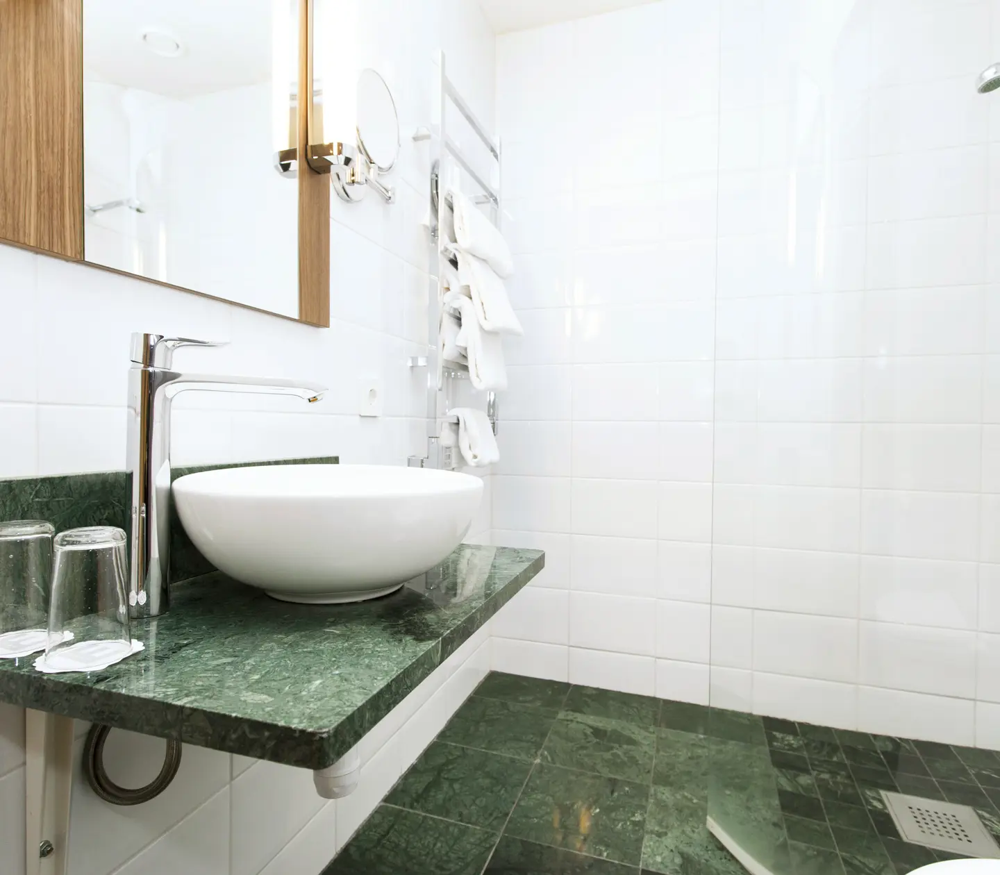 Bright bathroom with green floor