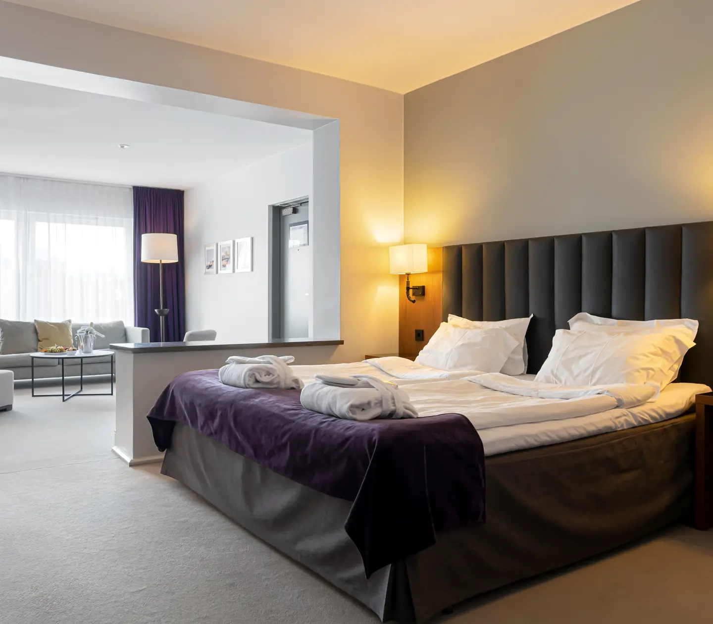 Suite with double bed, sofa and window