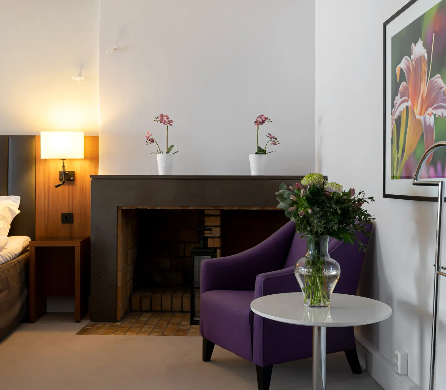Suite with wood stove and armchair