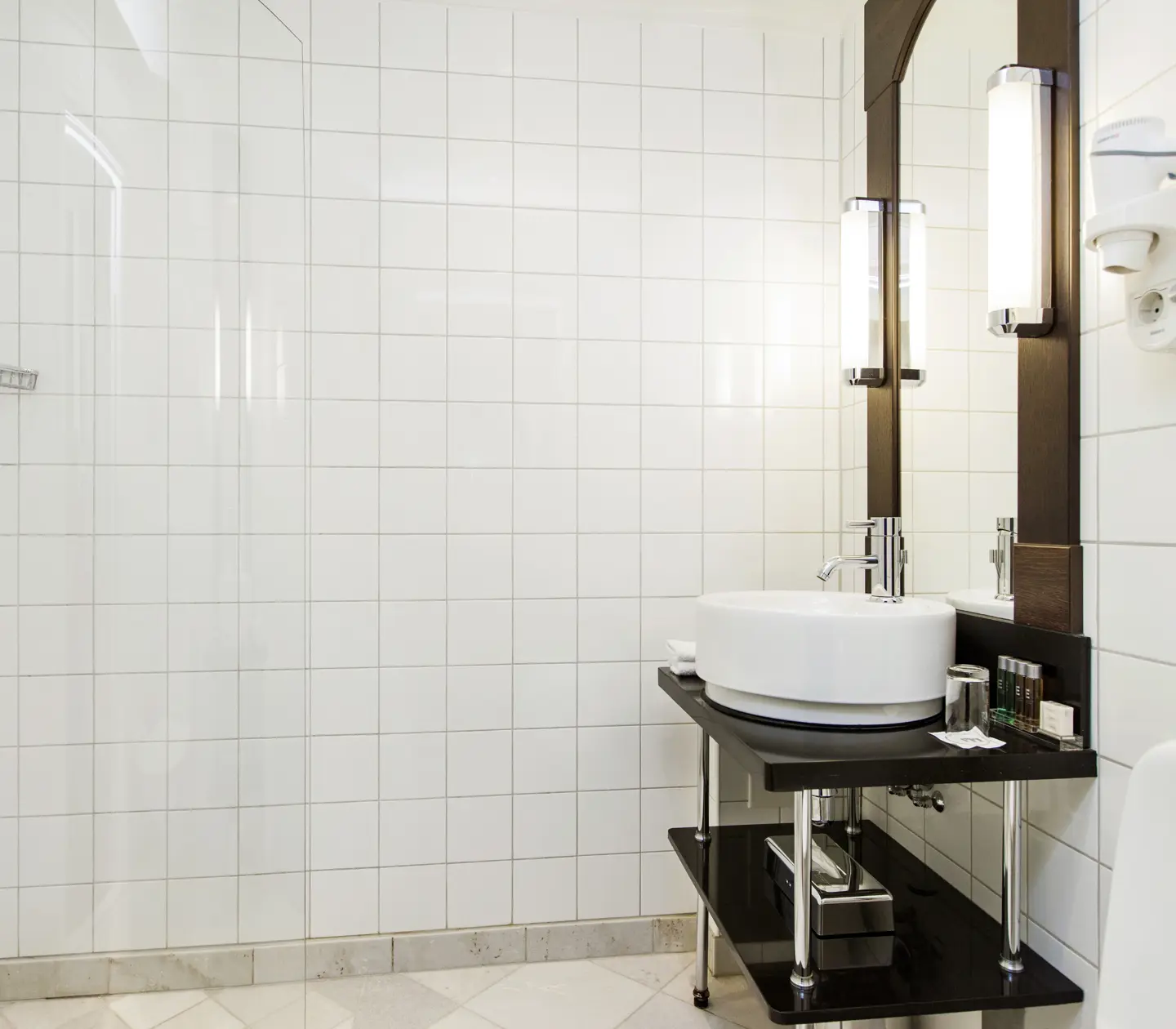 Bright bathroom with sink and toilet