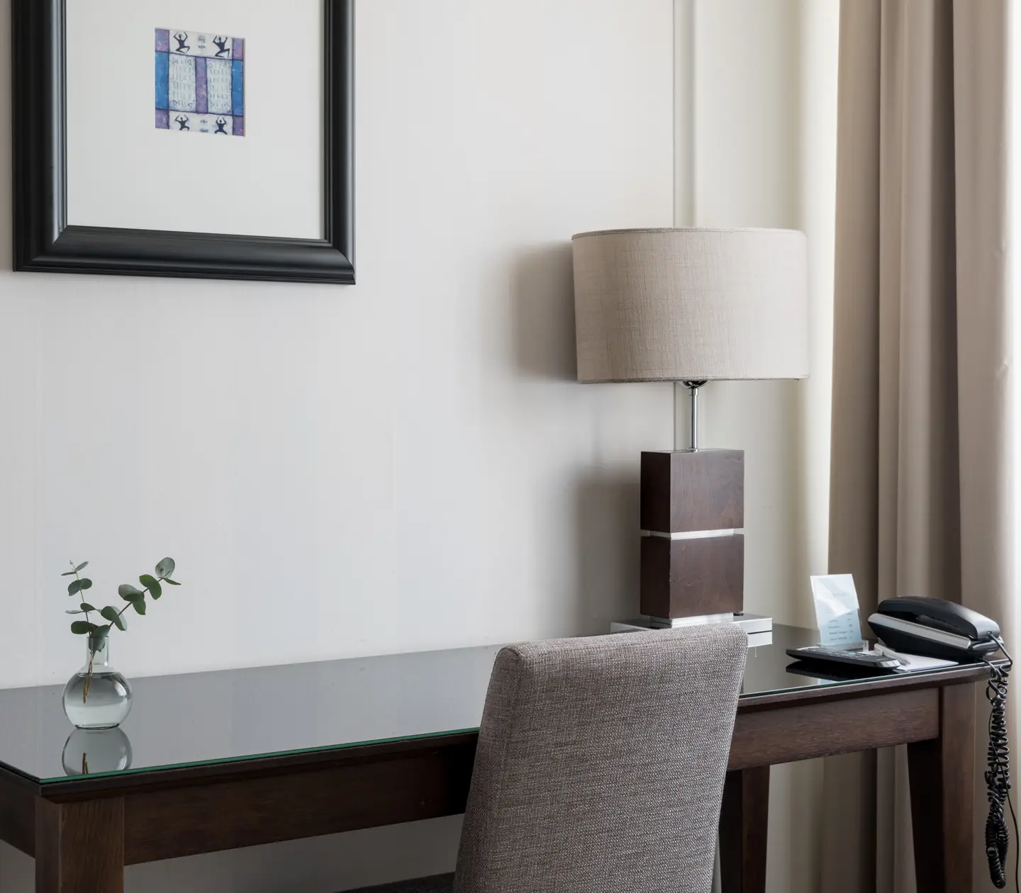 Desk and chair in a bright room