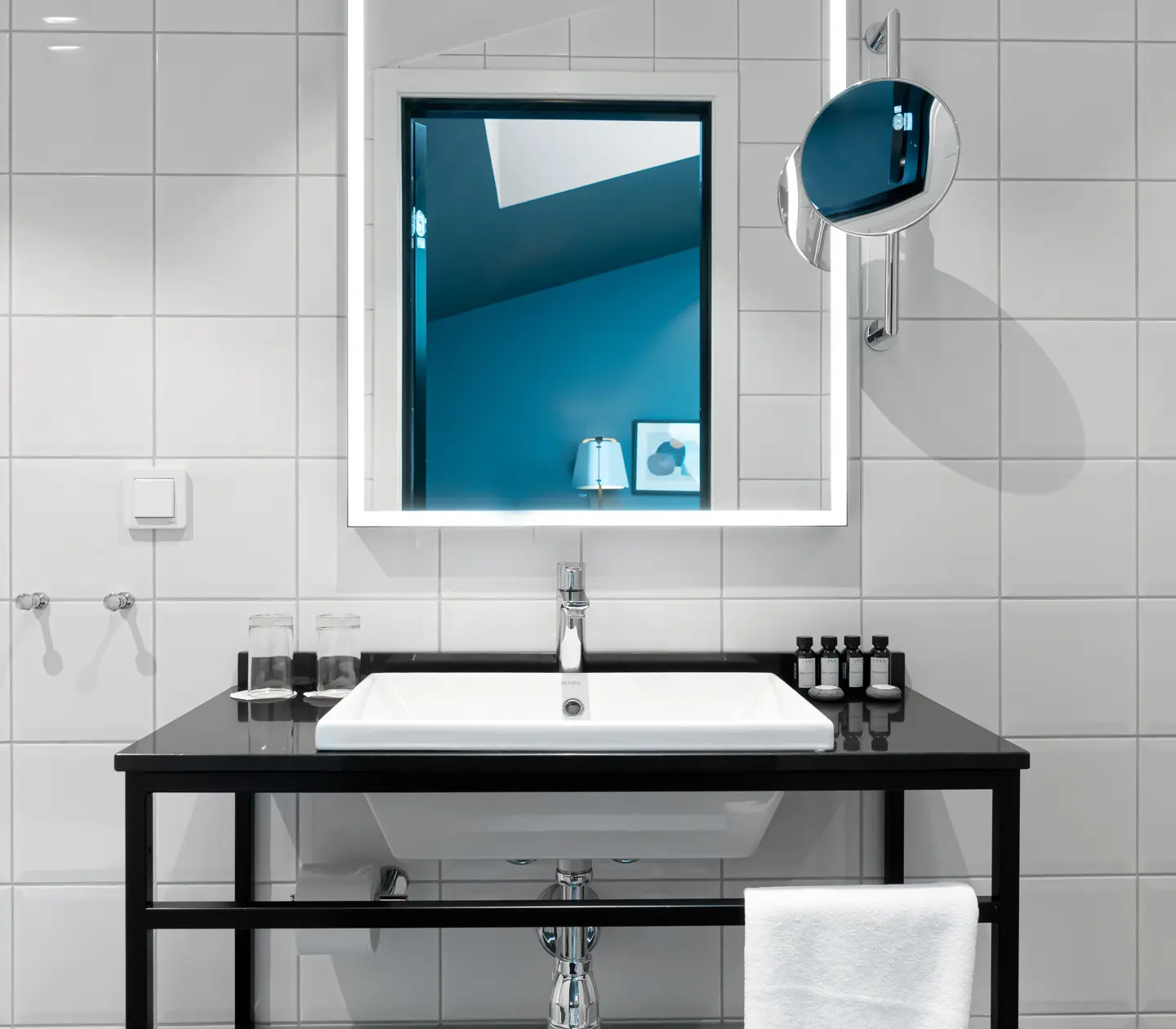 Bright bathroom with sink and mirror