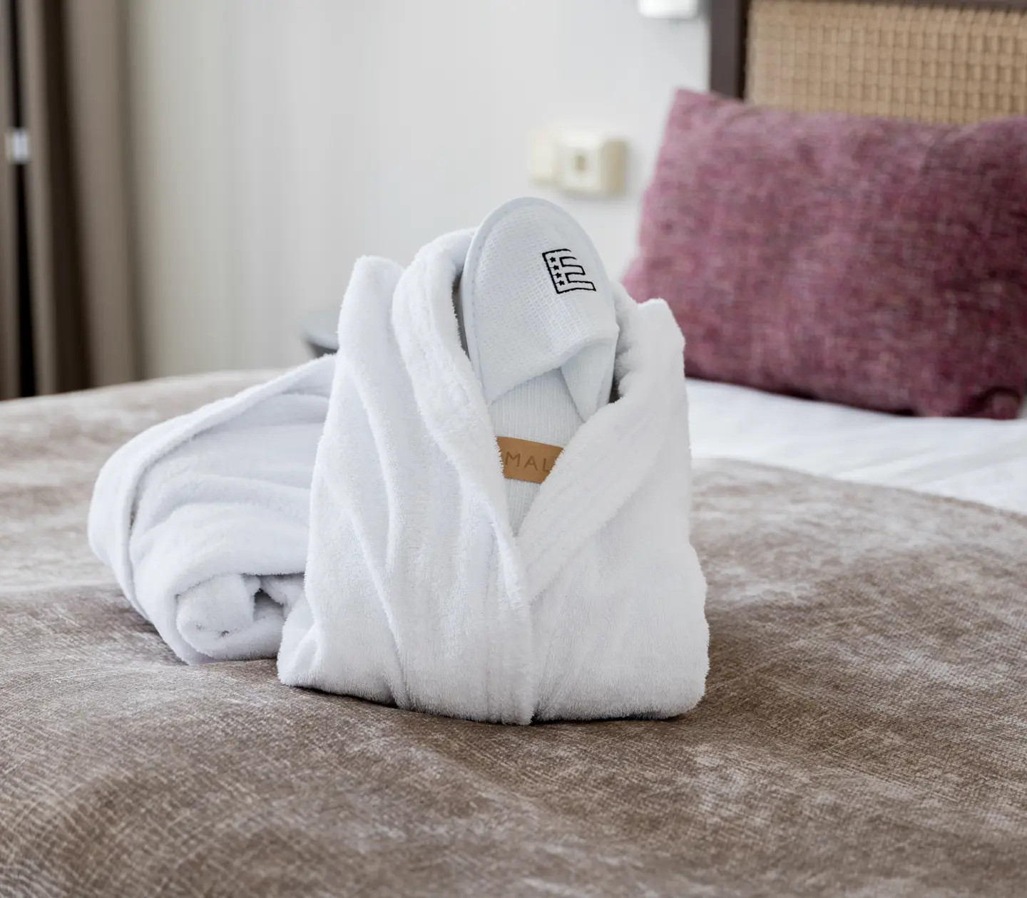 Bathrobes on a bed