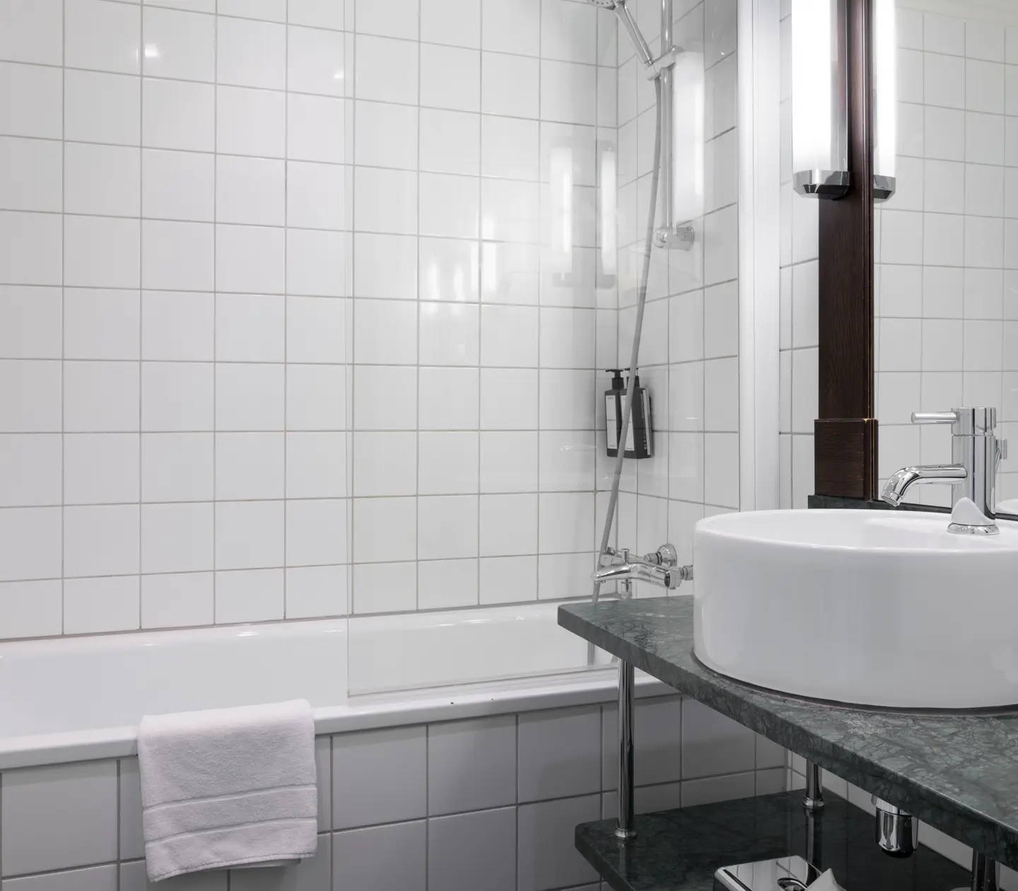 Bathroom with sink and bathtub