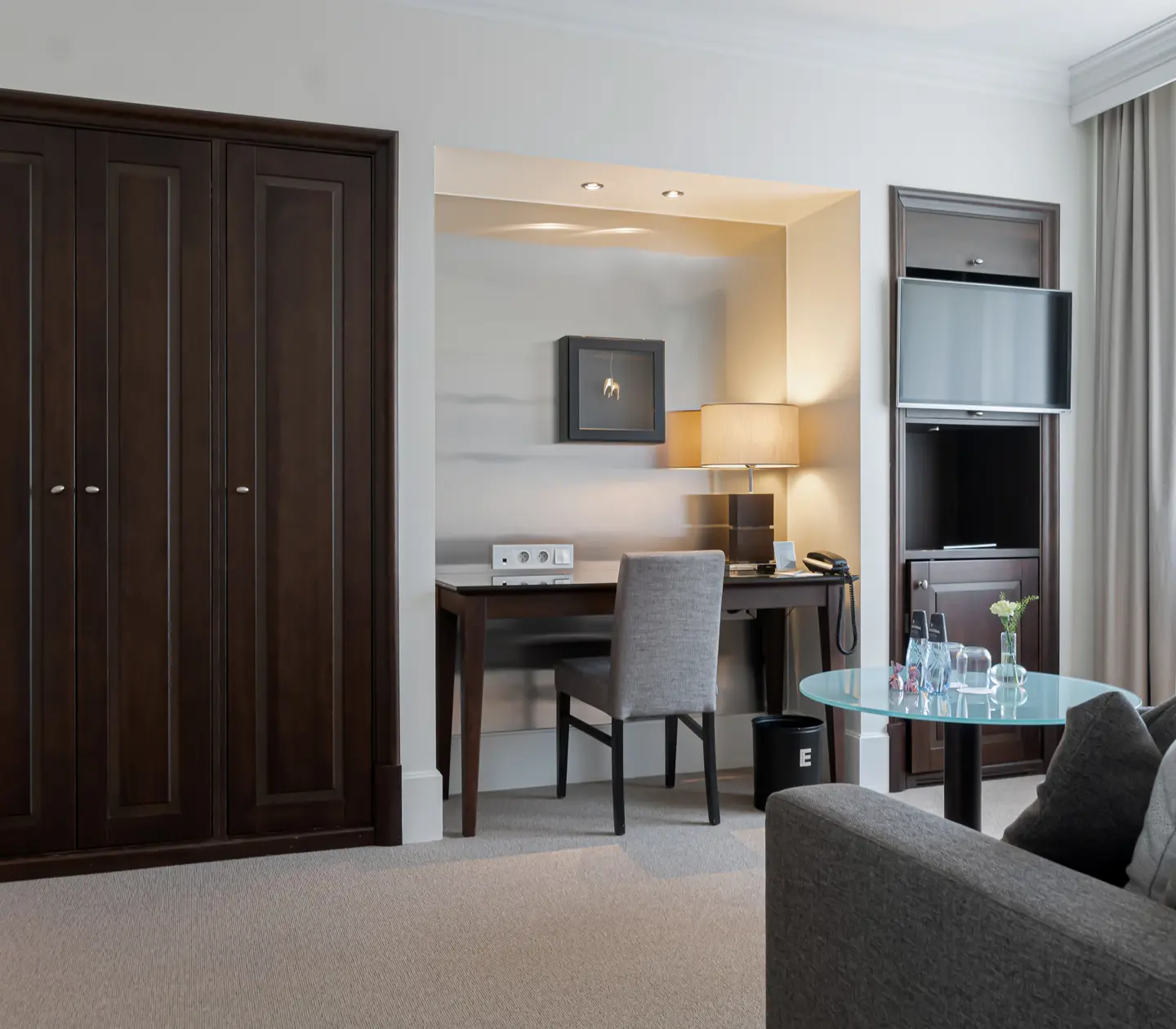 Suite with sofa, desk and TV