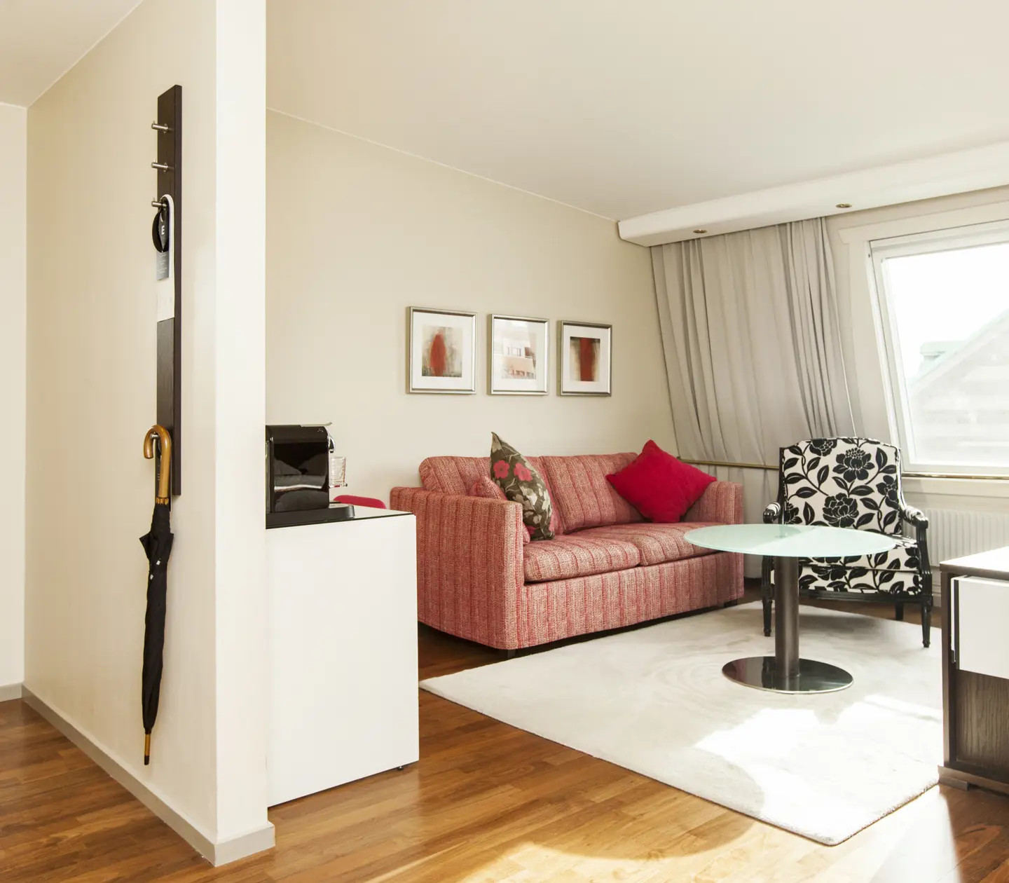 Hotel room with sofa group and window