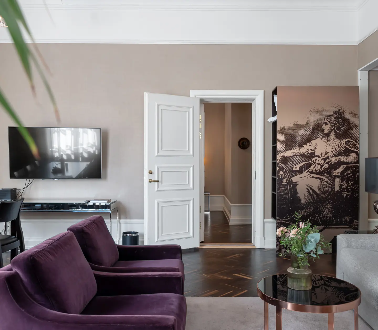 Bright suite with sofa group, TV and wardrobe