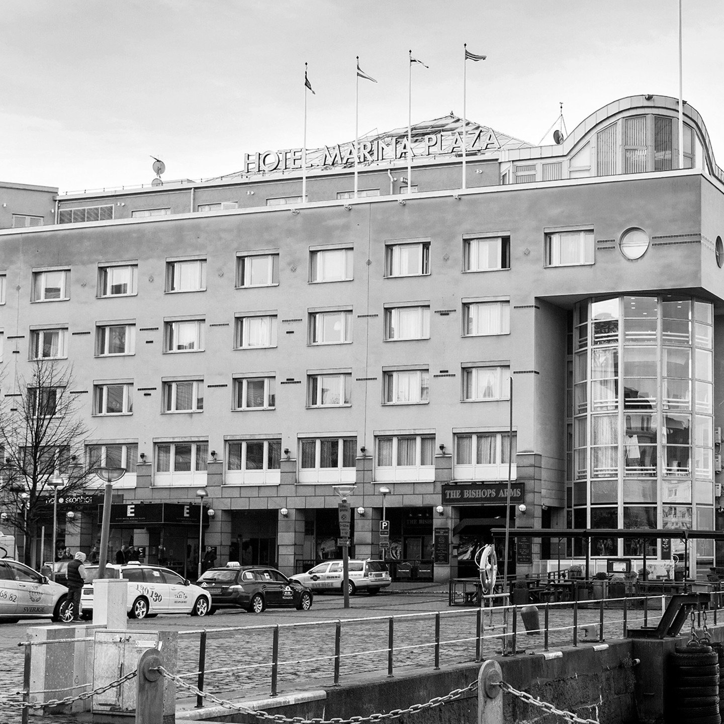 Black and white photo of Elite Hotel Marina Plaza's facade