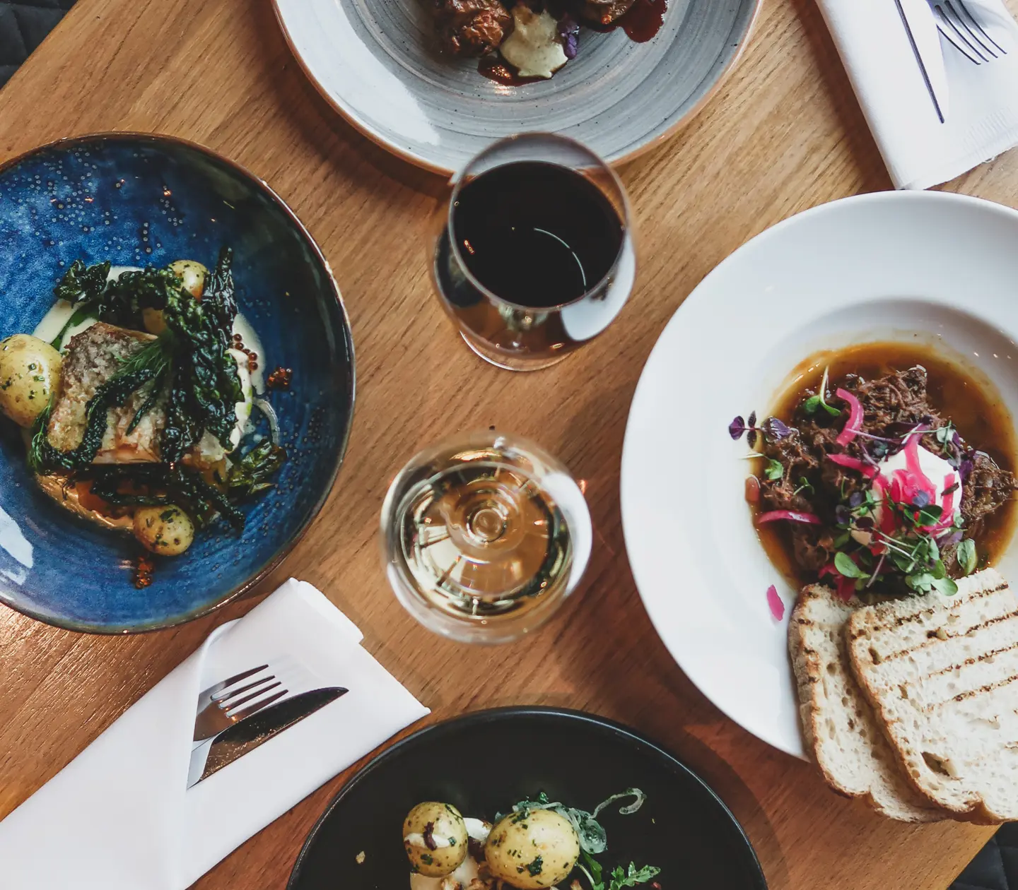 Food shot from above with bread and wine in the glass