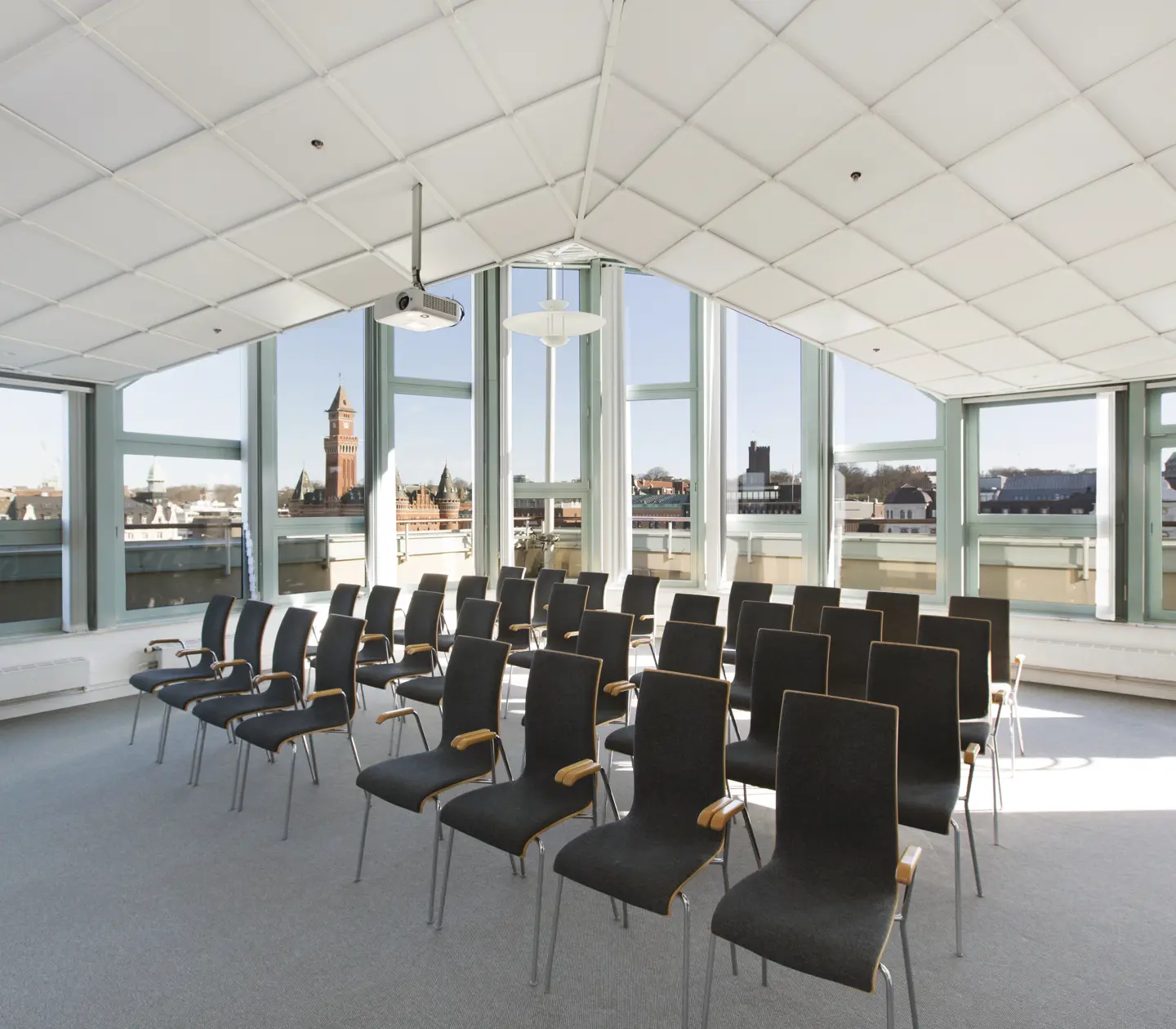 Conference room with chairs and large windows