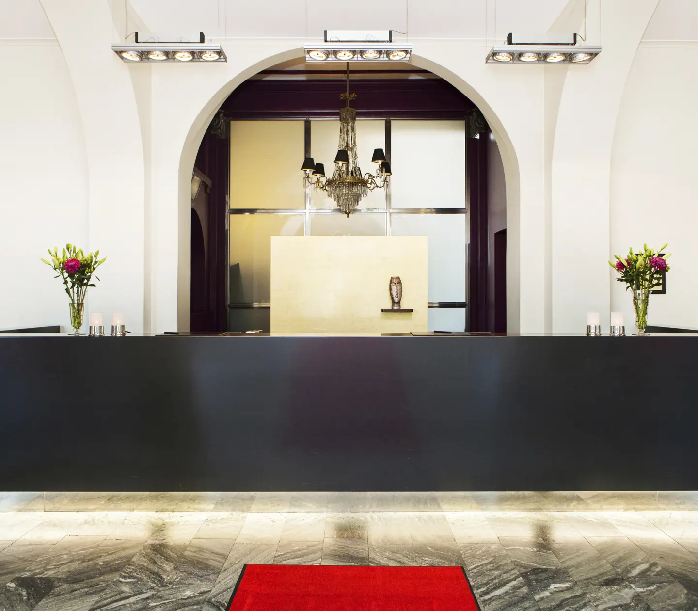 Large reception desk with vault behind
