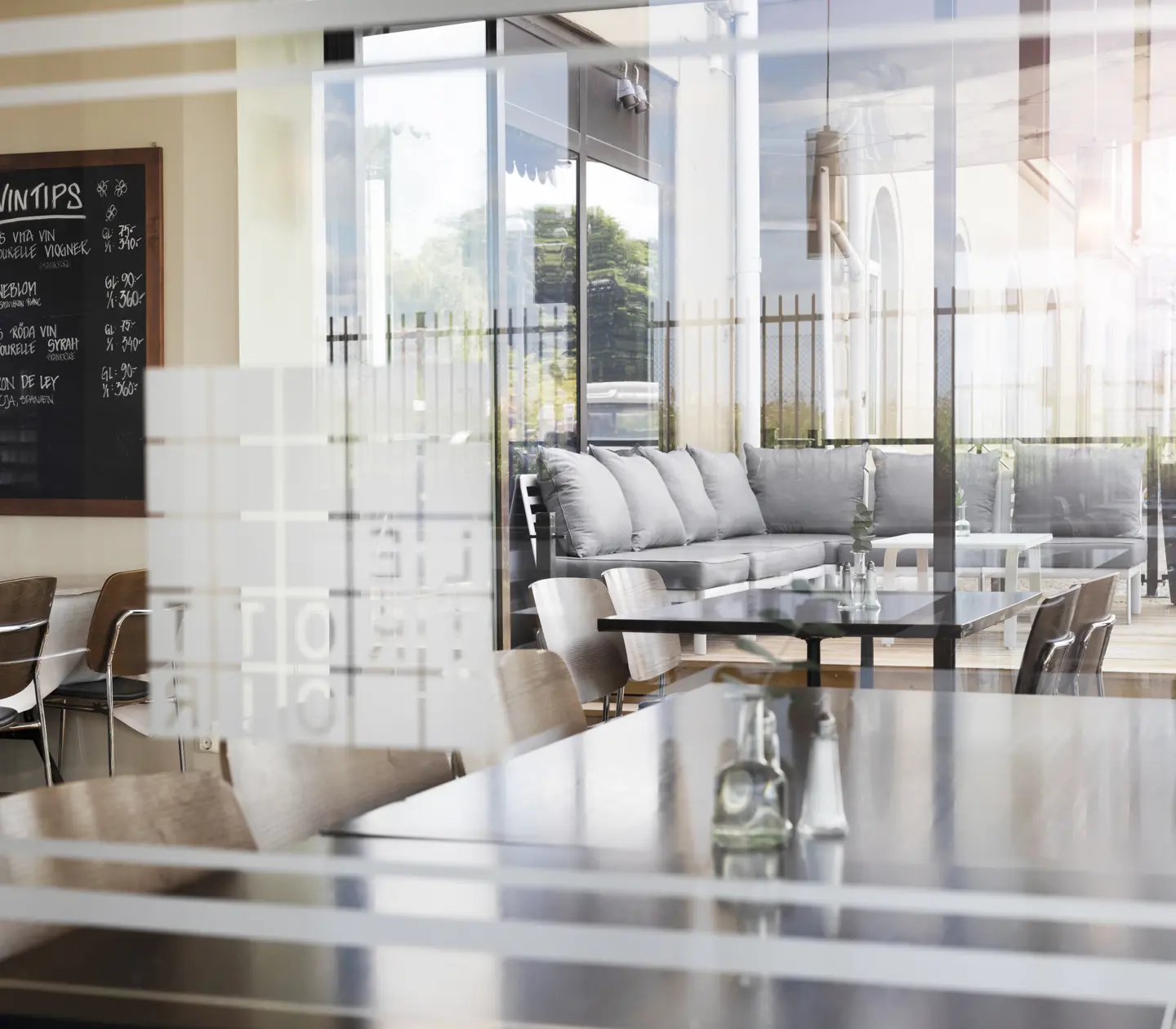 Bright restaurant environment with menus and seating areas