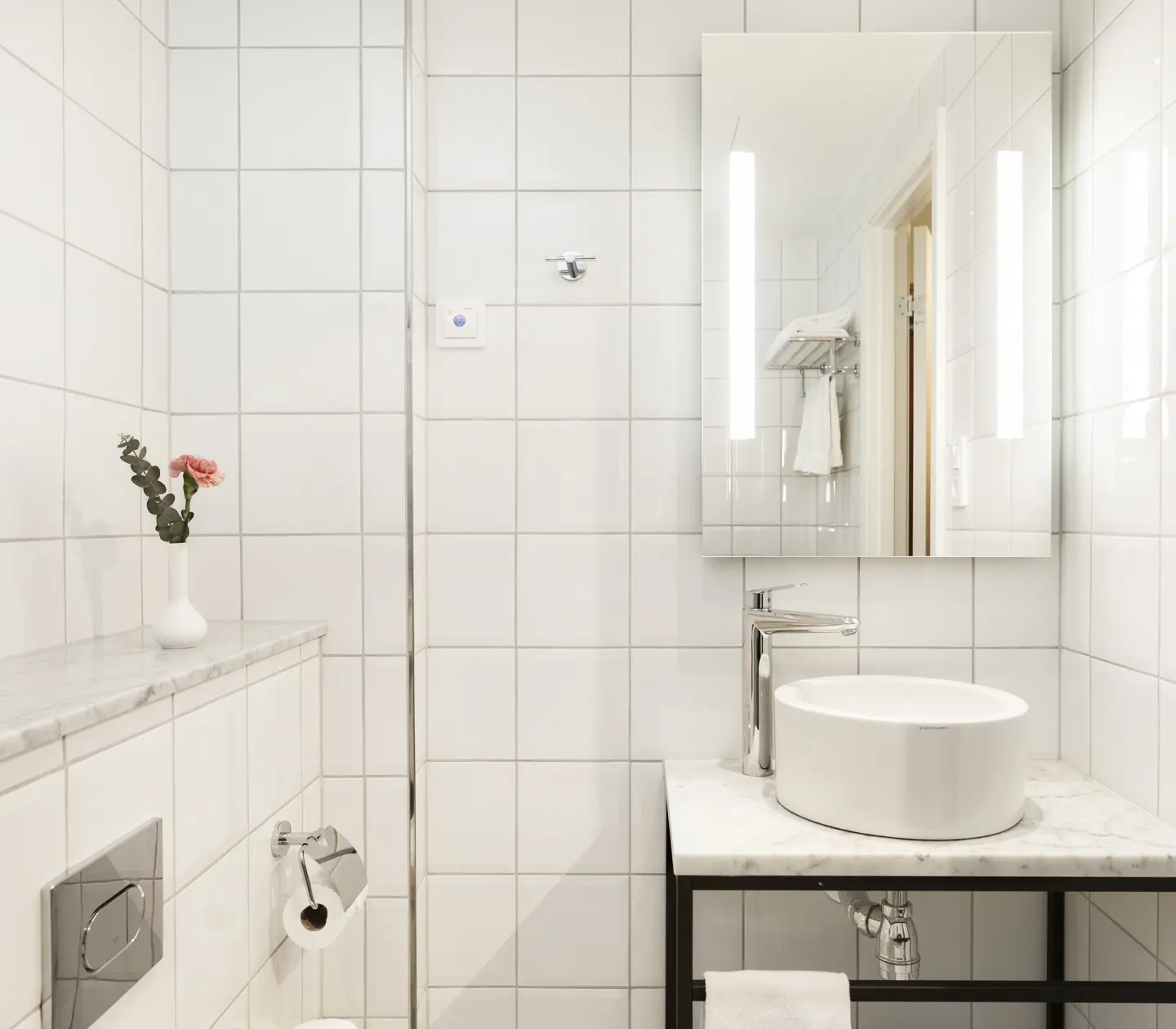 Bright bathroom with sink and mirror