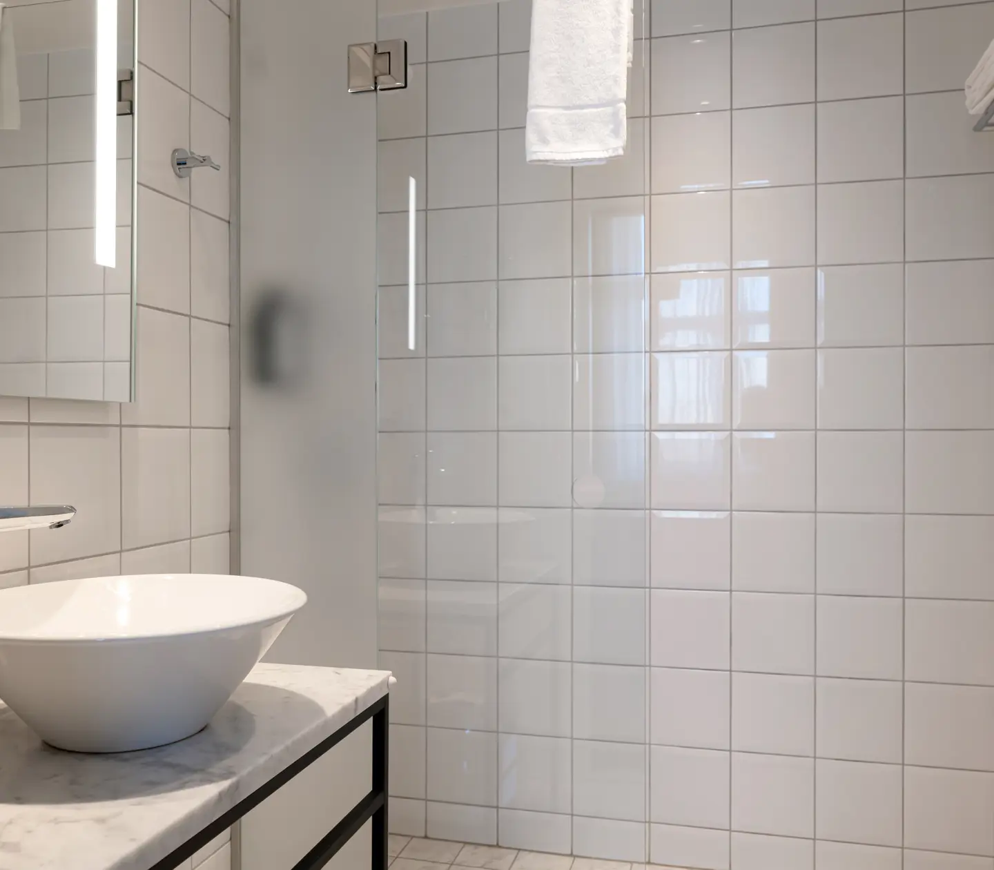 Bright bathroom with sink and mirror