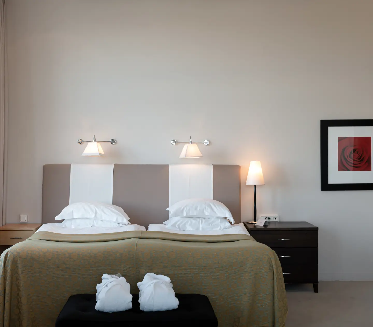 Suite with bed, board and bathrobes