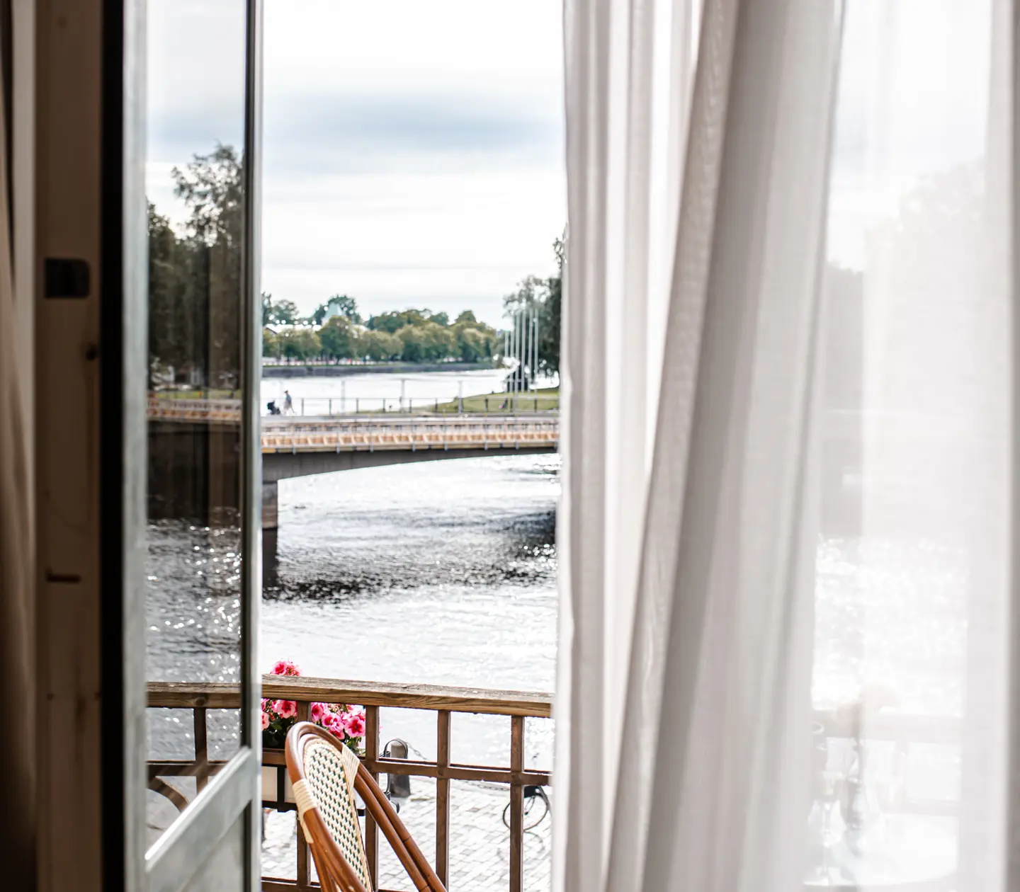 Open balcony door, view of the Klarälven and plants