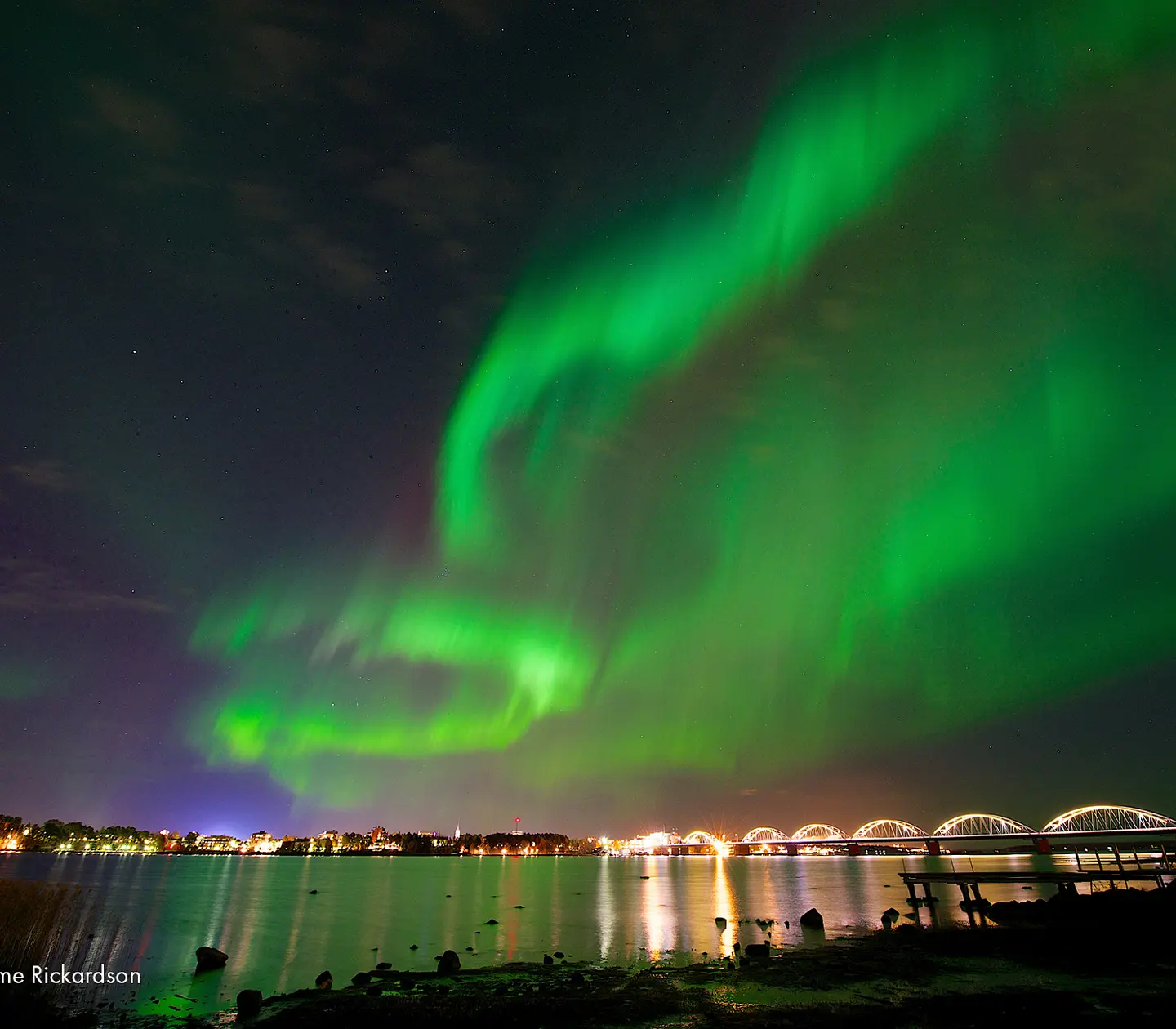 Northern lights over Luleå reflecting in the water