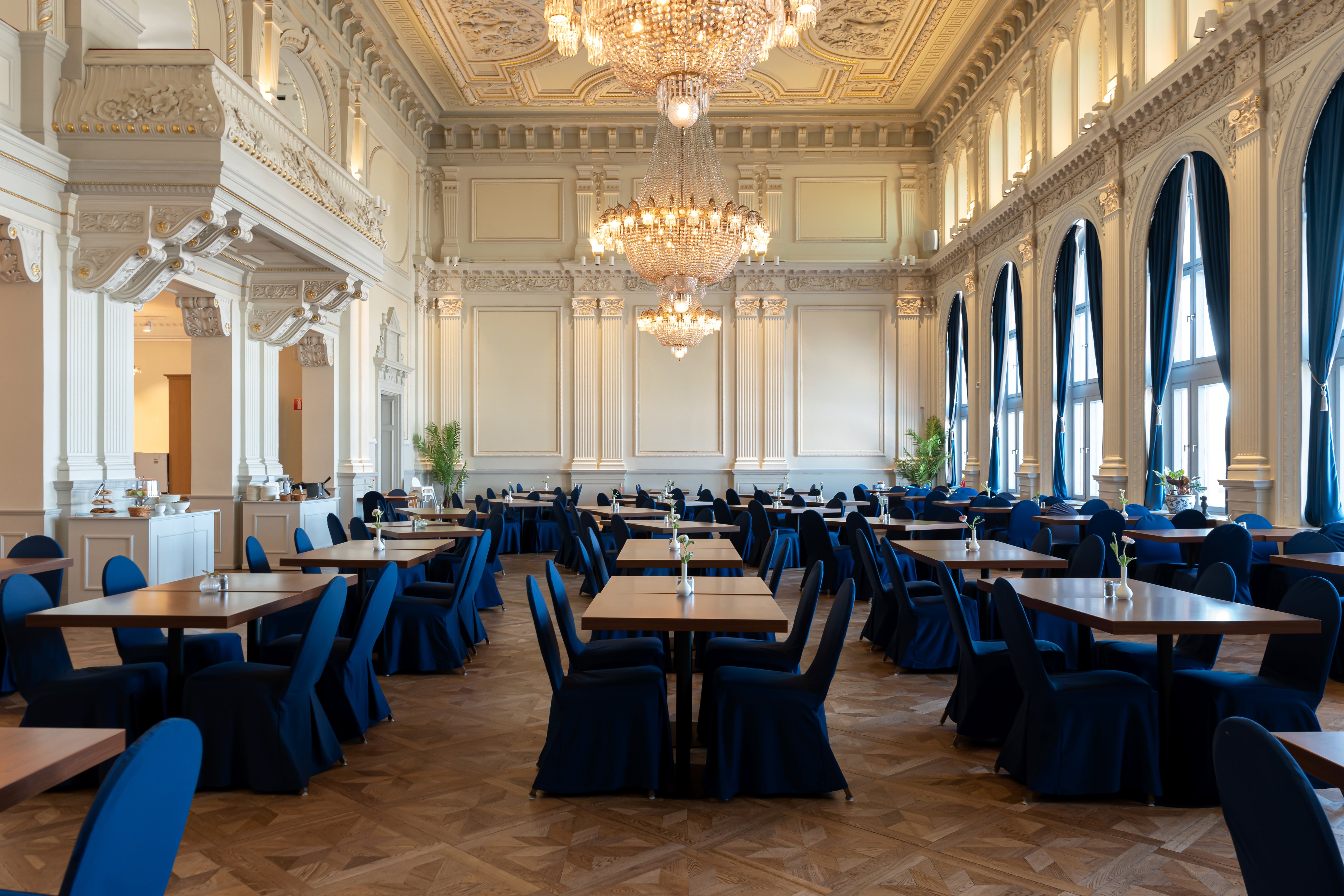 A grand hall with tables and seating