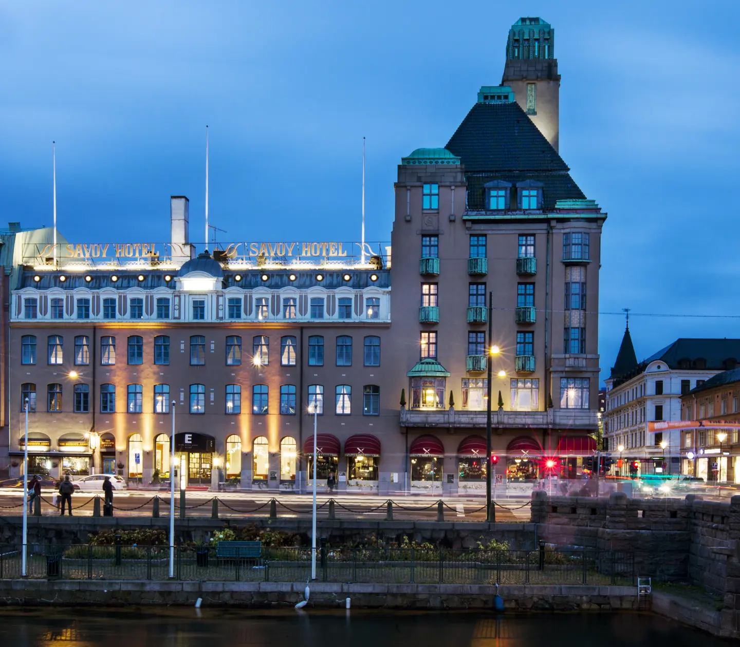 The facade of the Elite Hotel Savoy in evening twilight