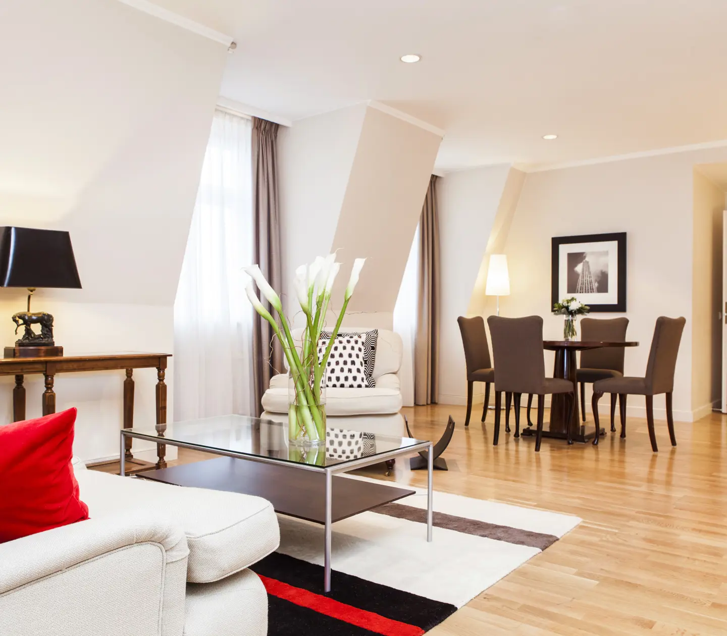 Suite with dining area, sofa area and window