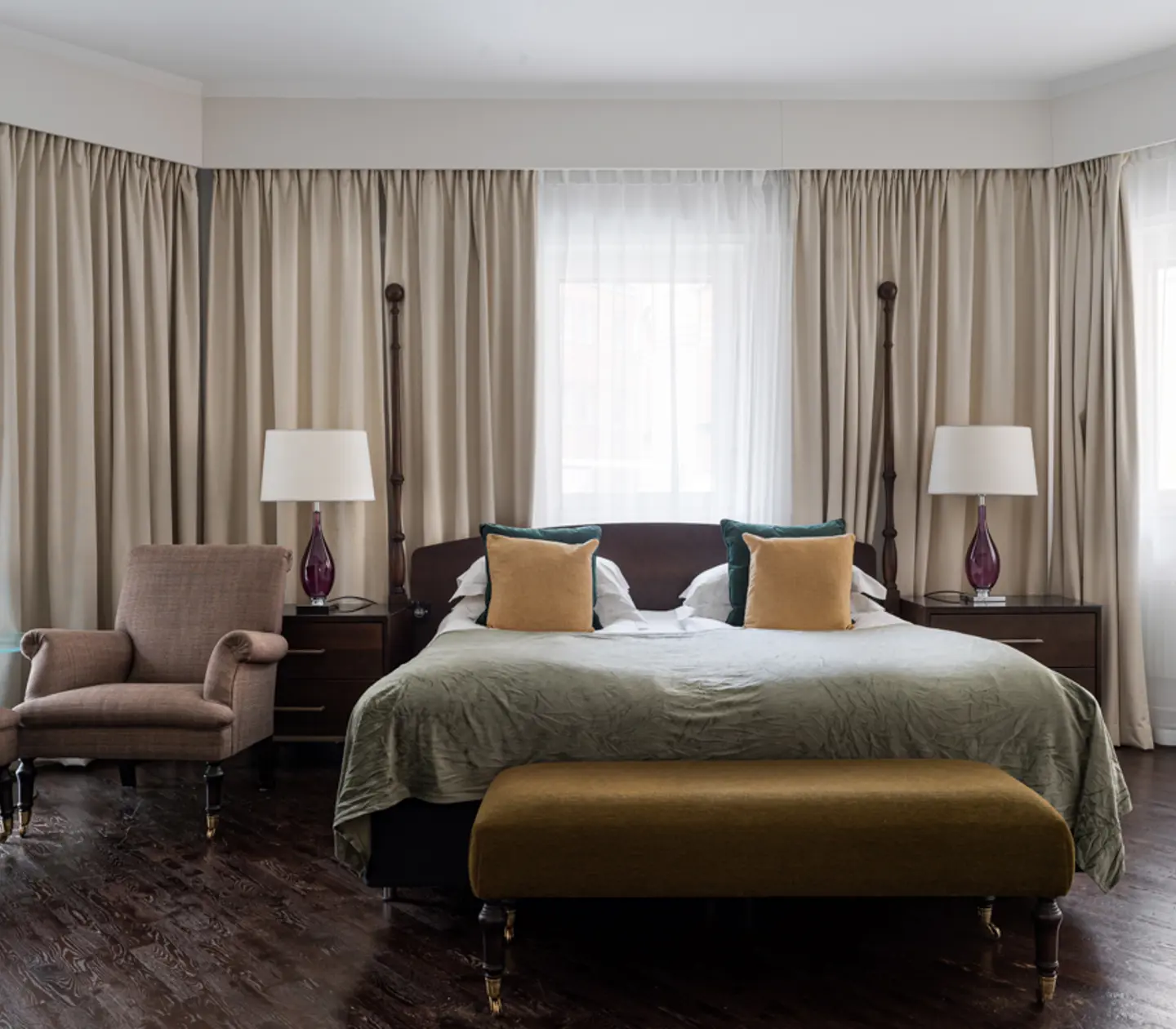 Cozy hotel room with bed, window and curtains