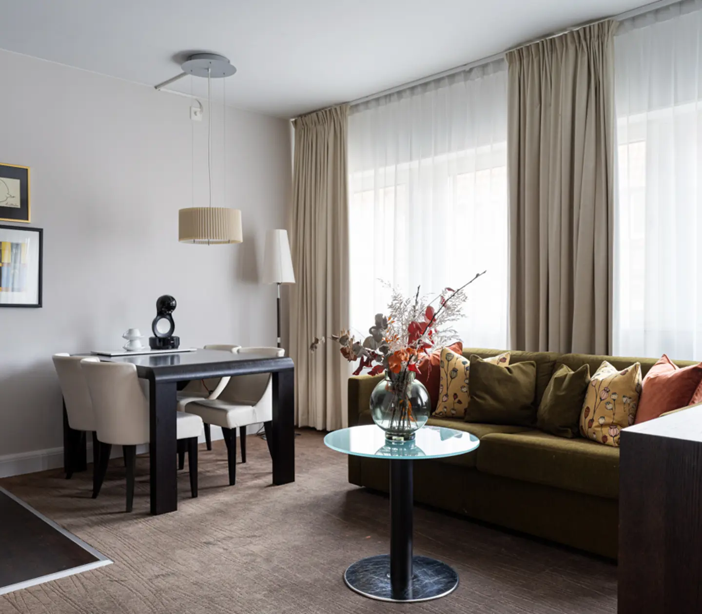 Bright suite with sofa group, TV and double bed