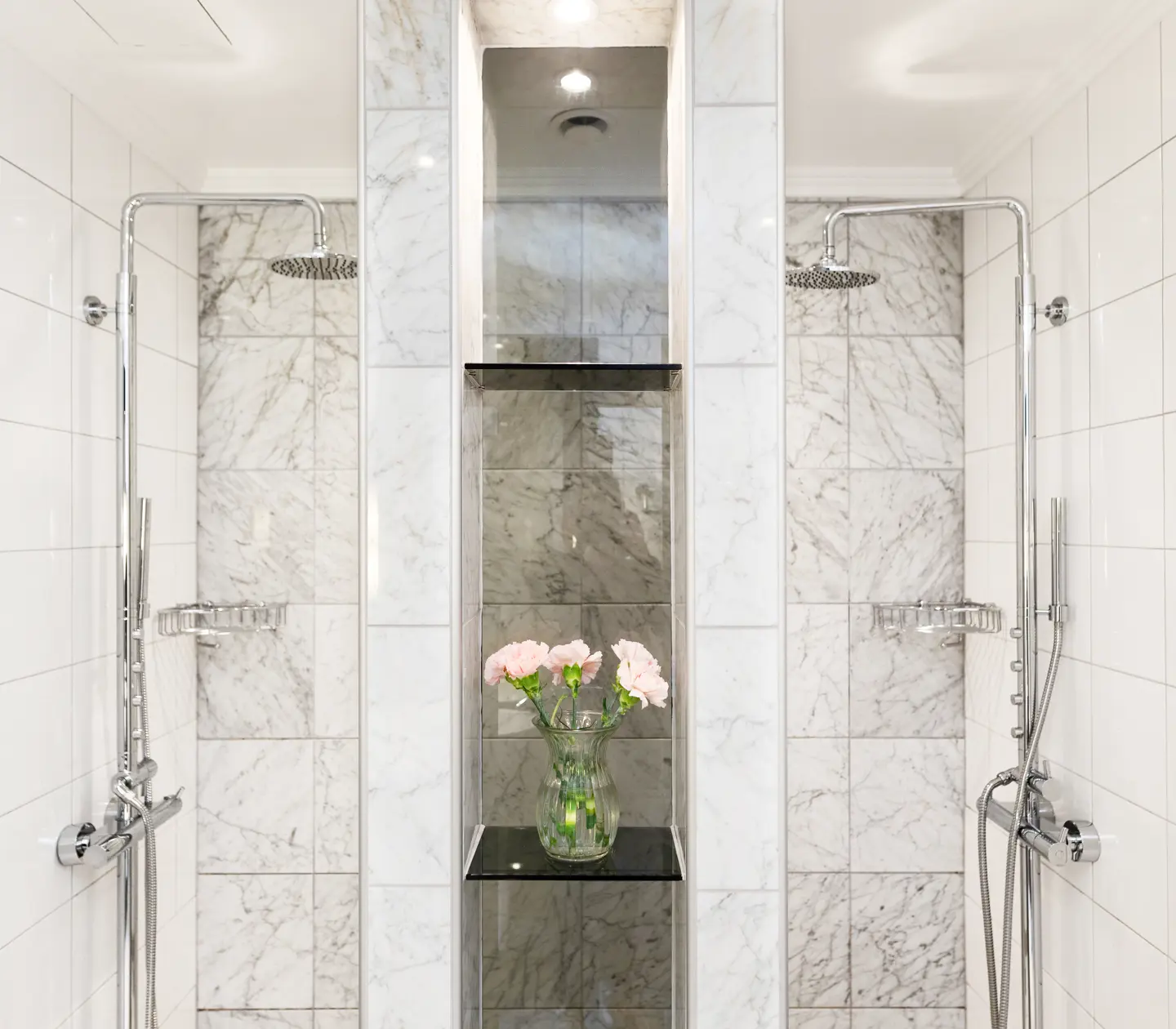 Bright bathroom with double shower and flower