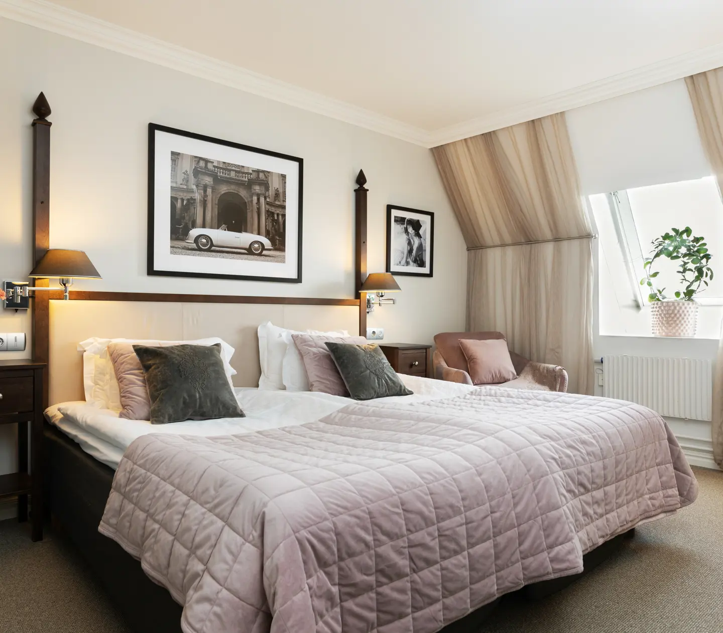 Cozy suite with bed, armchair and window
