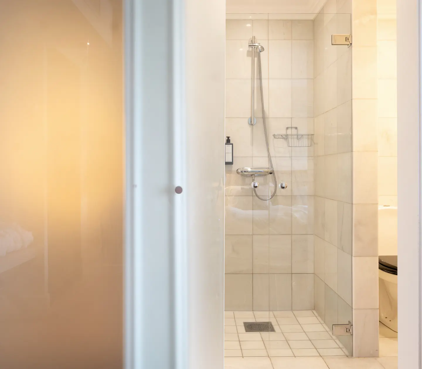 Beige bathroom with shower