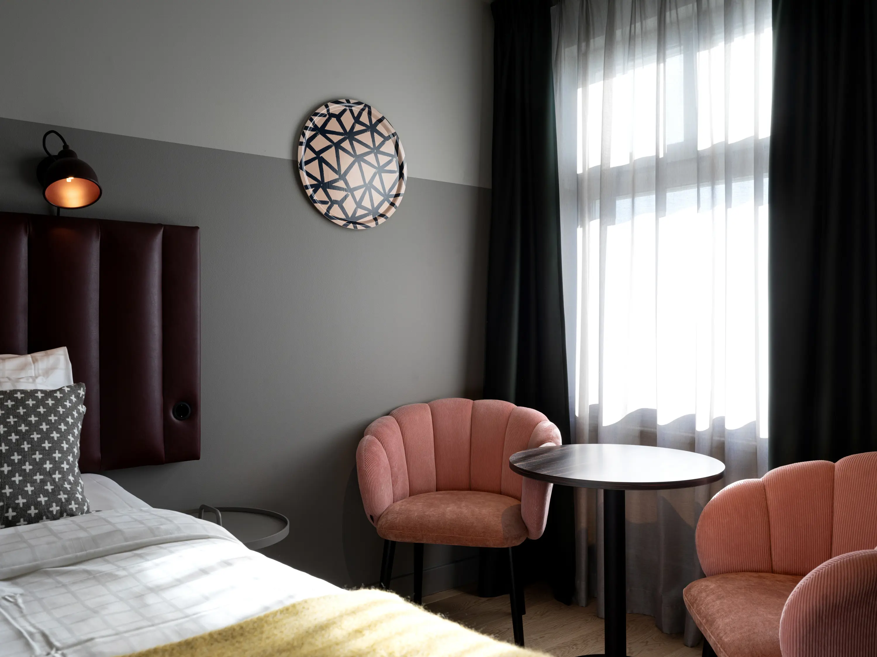 Cozy hotel room with bed and desk