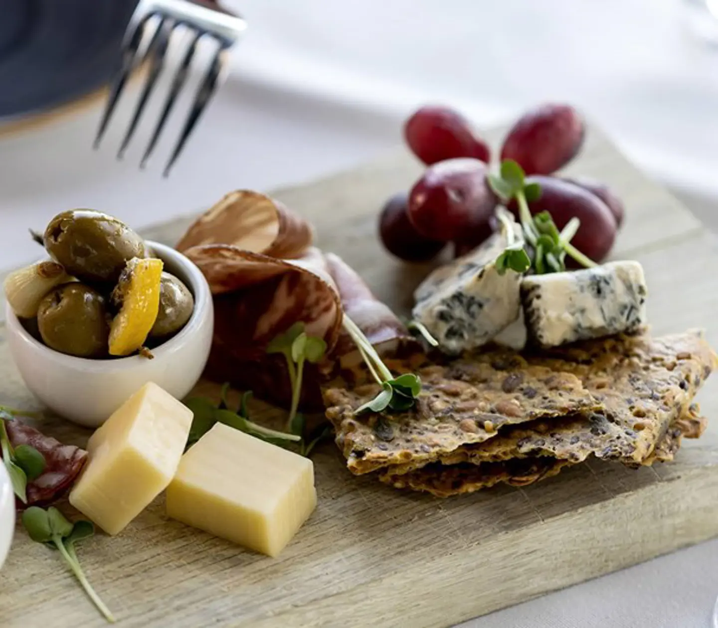 Tray with cheese and grapes