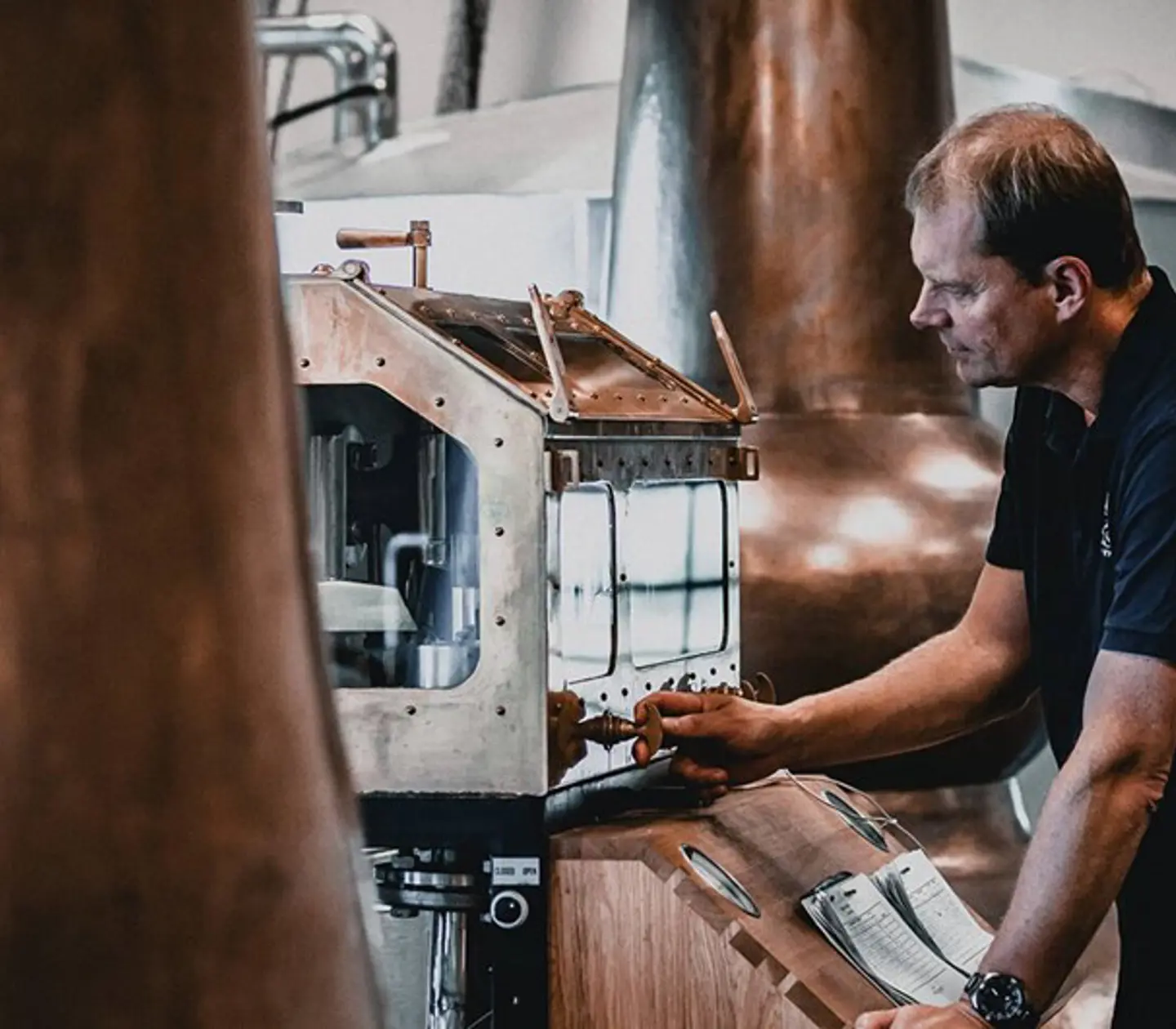 Man standing at machine