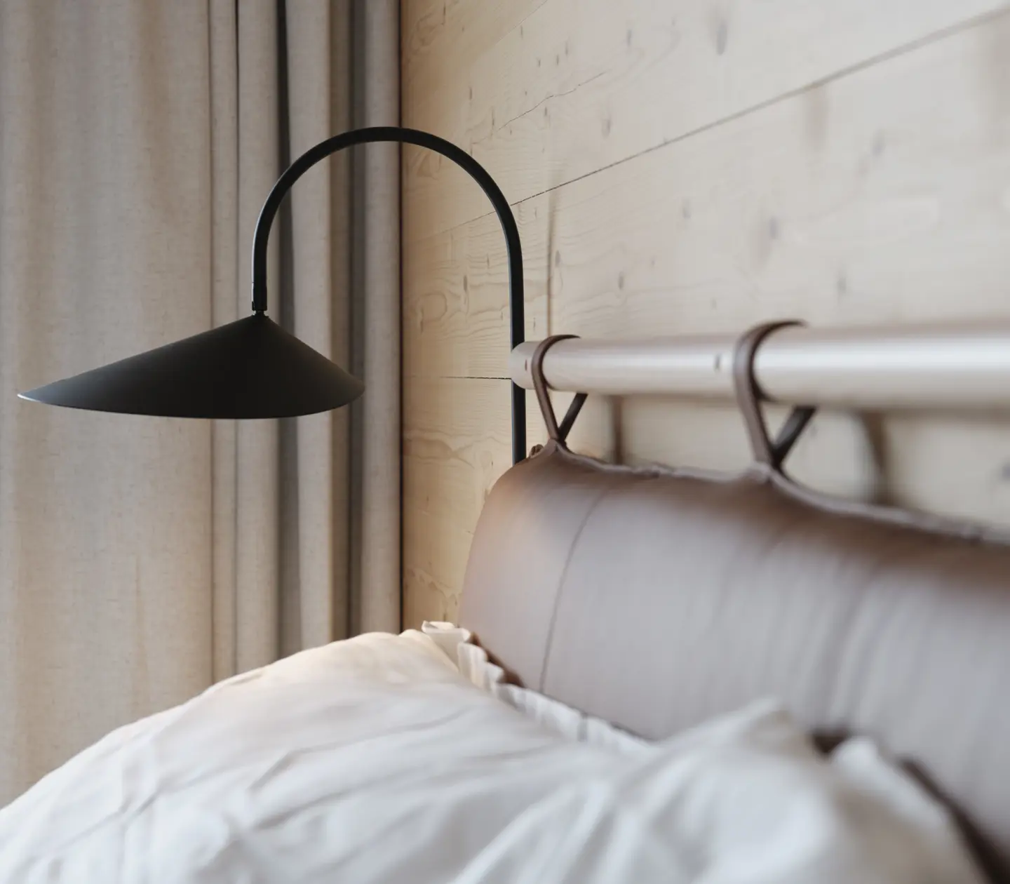 A hotel bed at The Wood Hotel in Skellefteå