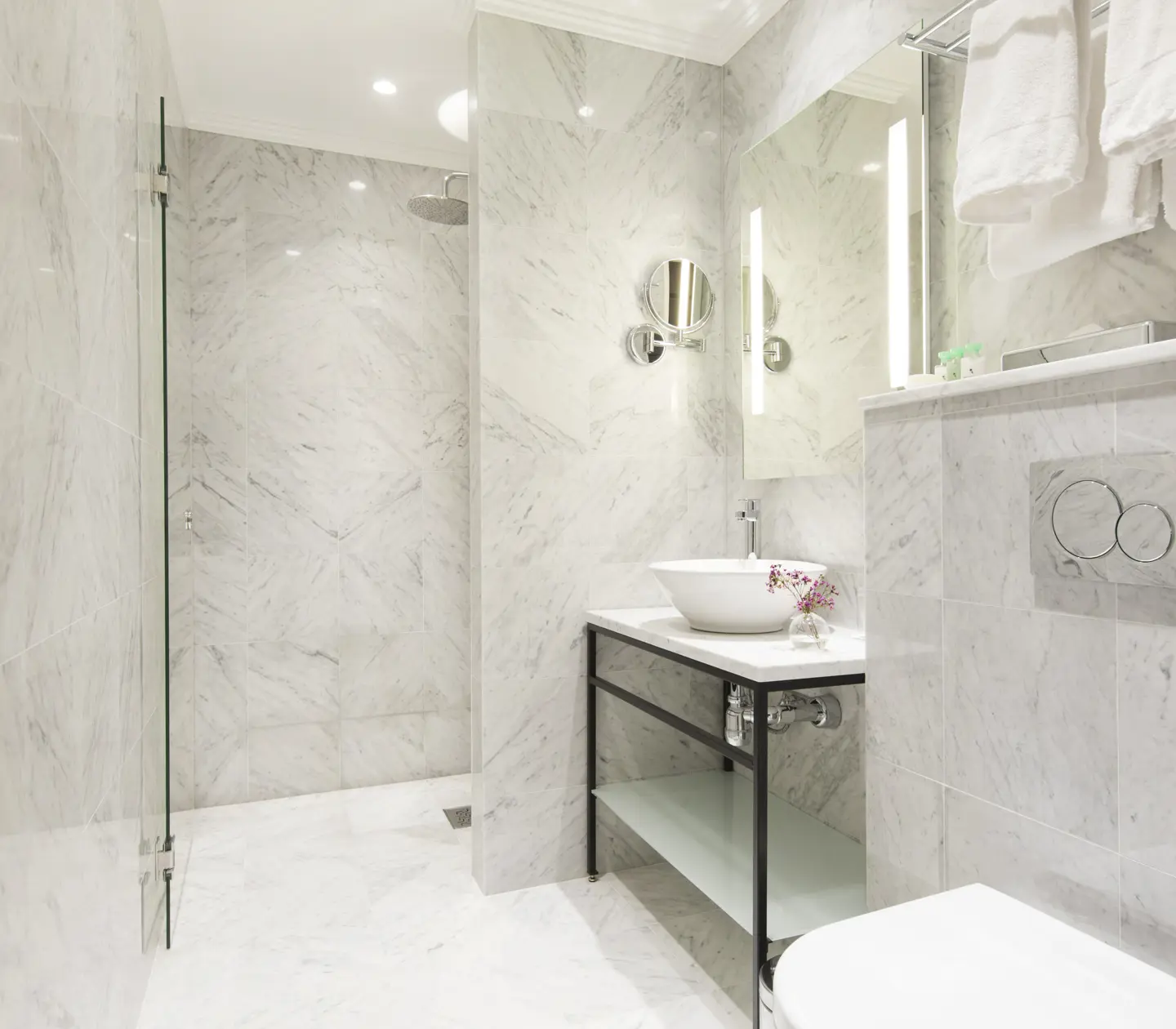 Beautiful bathroom with shower, sink and toilet