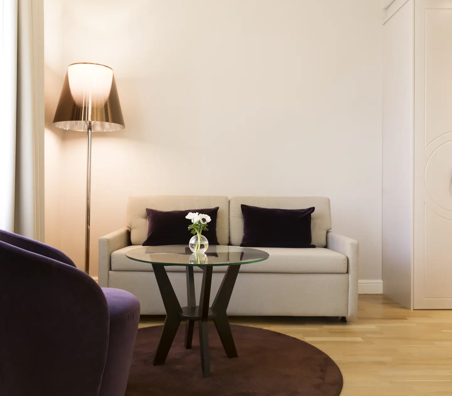 Seating area with sofa and armchair