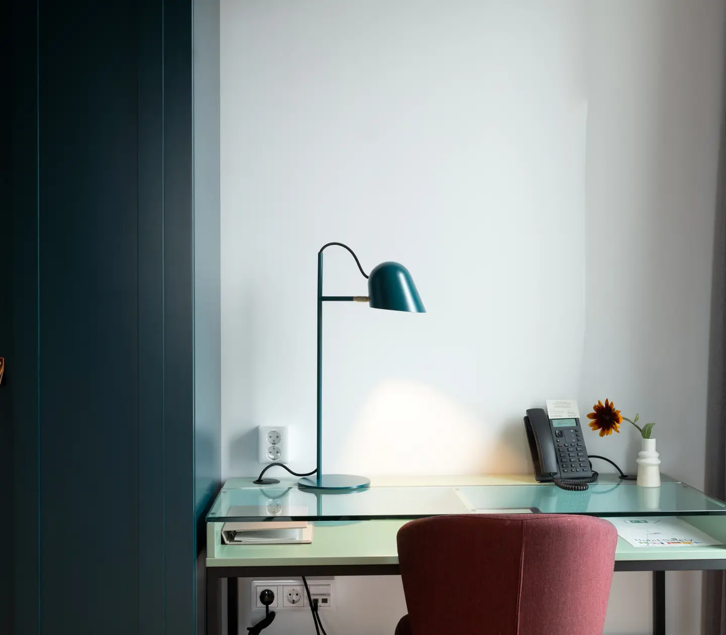 Bright suite with desk, wardrobe and table lamp
