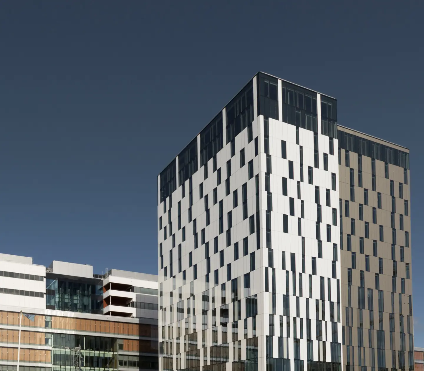 The black and white tall facade of the Elite Hotel Carolina Tower in Stockholm