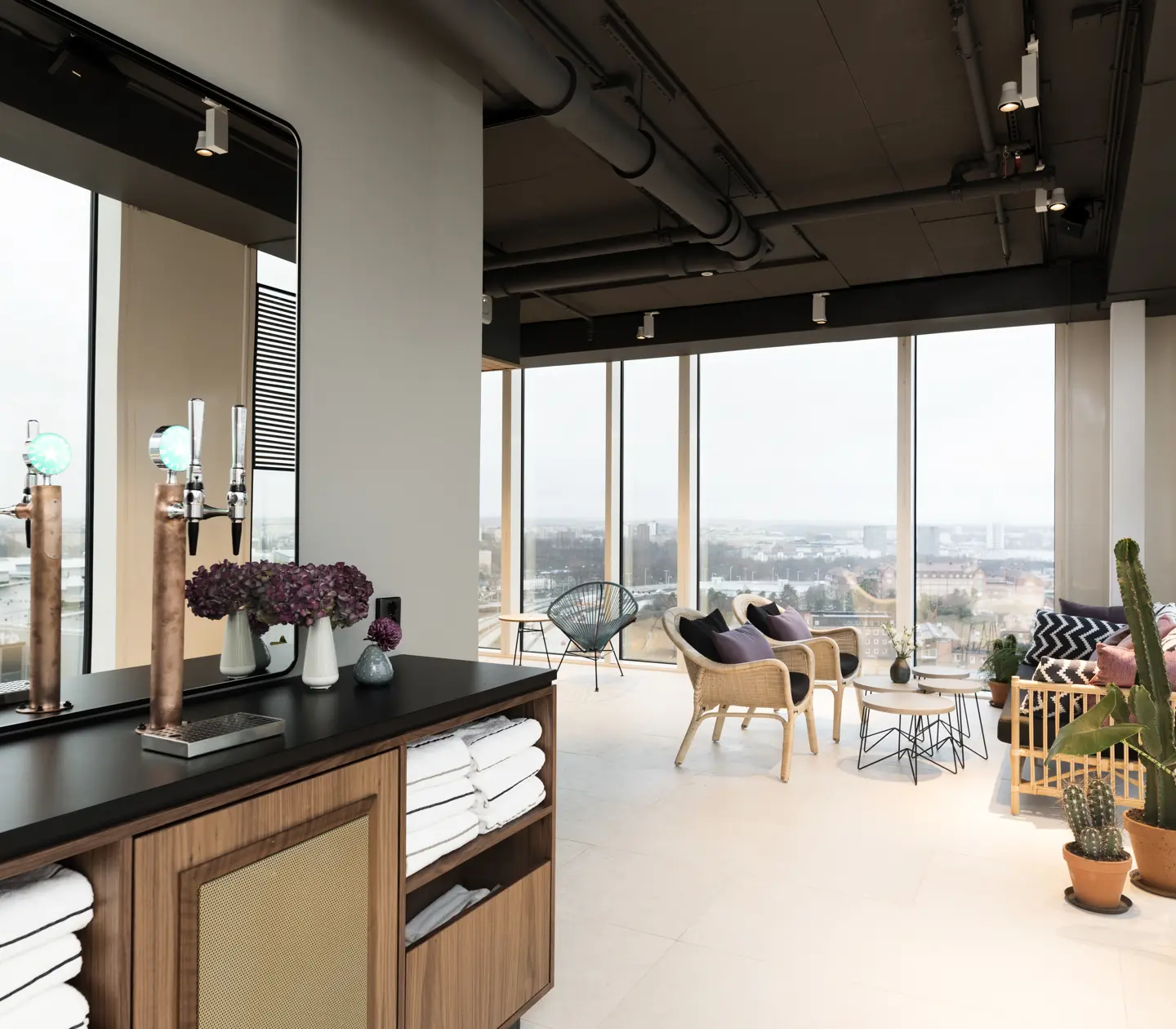 Penthouse with lounge furniture and windows