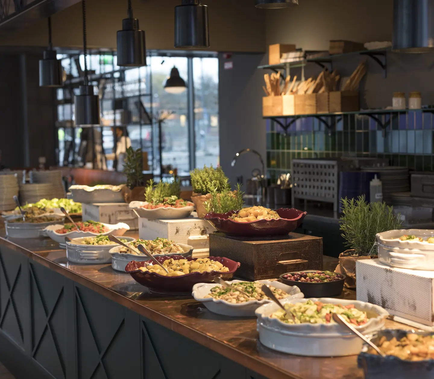 Restaurant environment with a buffet table with vegetarian food