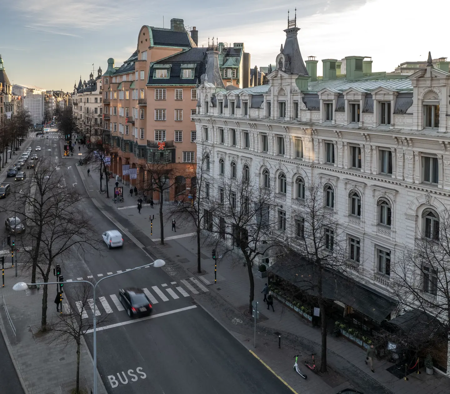 The white facade of Elite Hotel Stockholm Plaza photographed from above with Birger Jarlsgatan outside