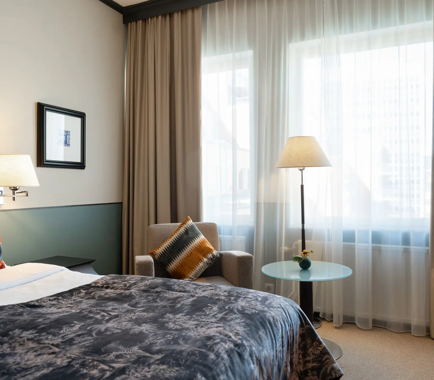 Table with lamp against window