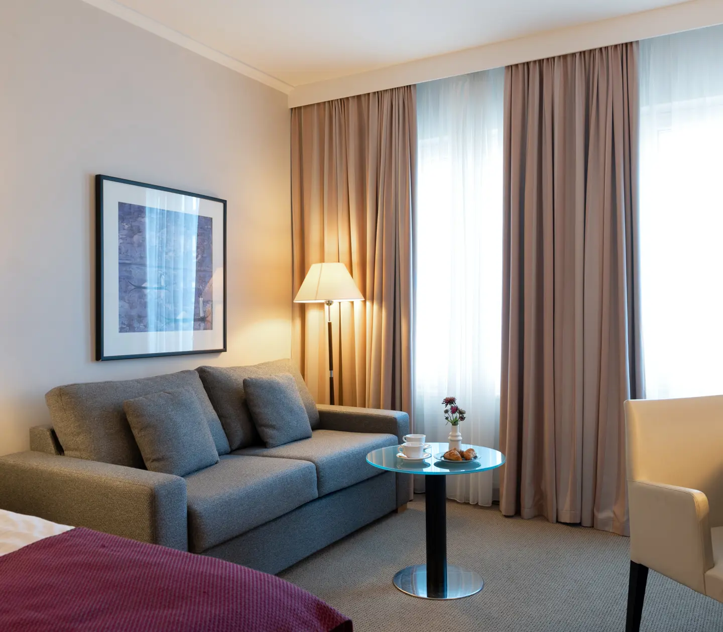 Lounge area with sofa and armchair