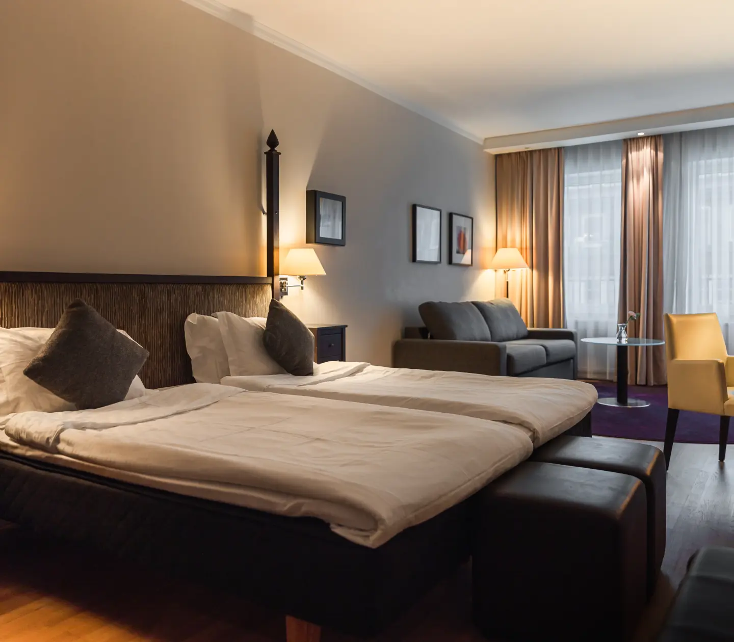Hotel bed and lounge area
