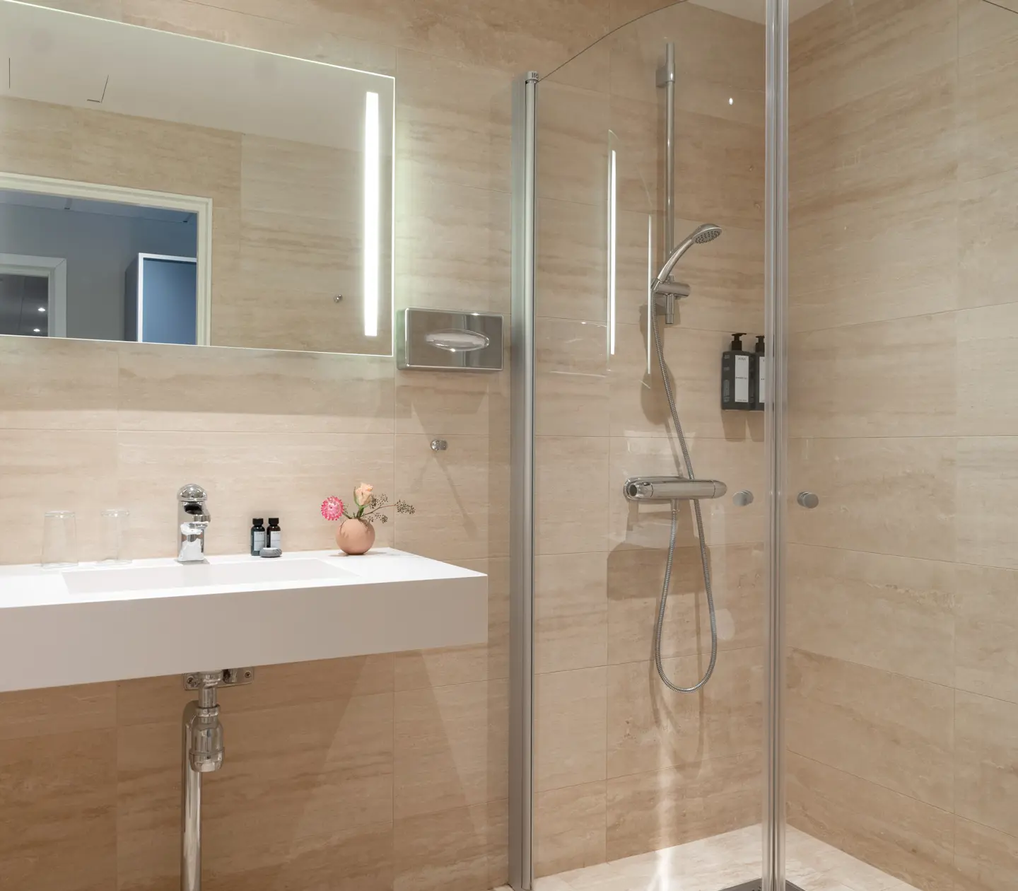 Washbasin and shower cabin