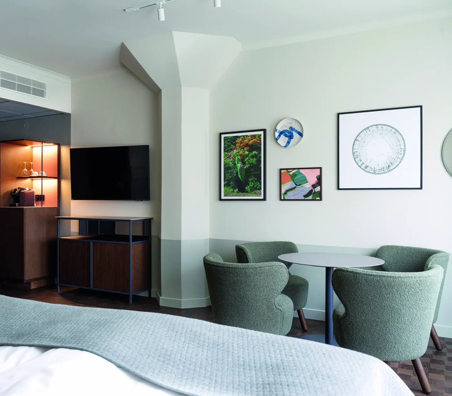 Large room with bed and seating area