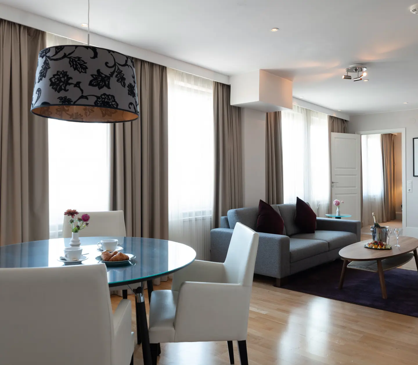 Hotel room with table and chairs